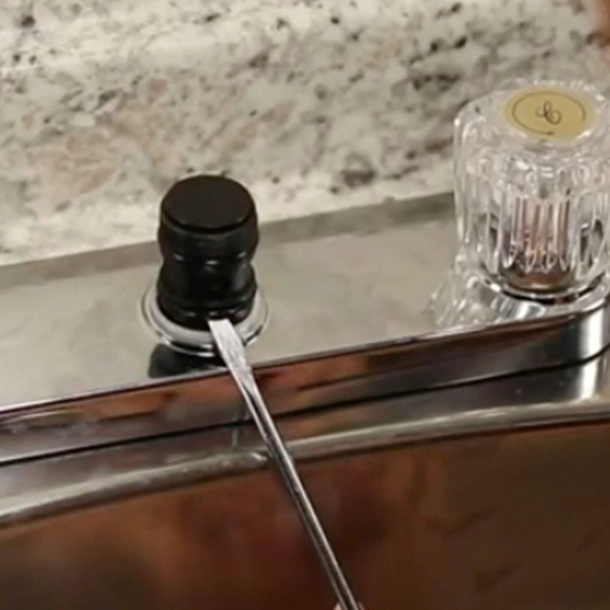 Waterproof Faucet Grease For Stems, Valves And Cartridges, Pro Grade Silicone Rich Lubricant For Leaky Faucets, Long Lasting Smooth Operation, NSF 61 Approved, Half Ounce By Danco applied to sink faucet knob.