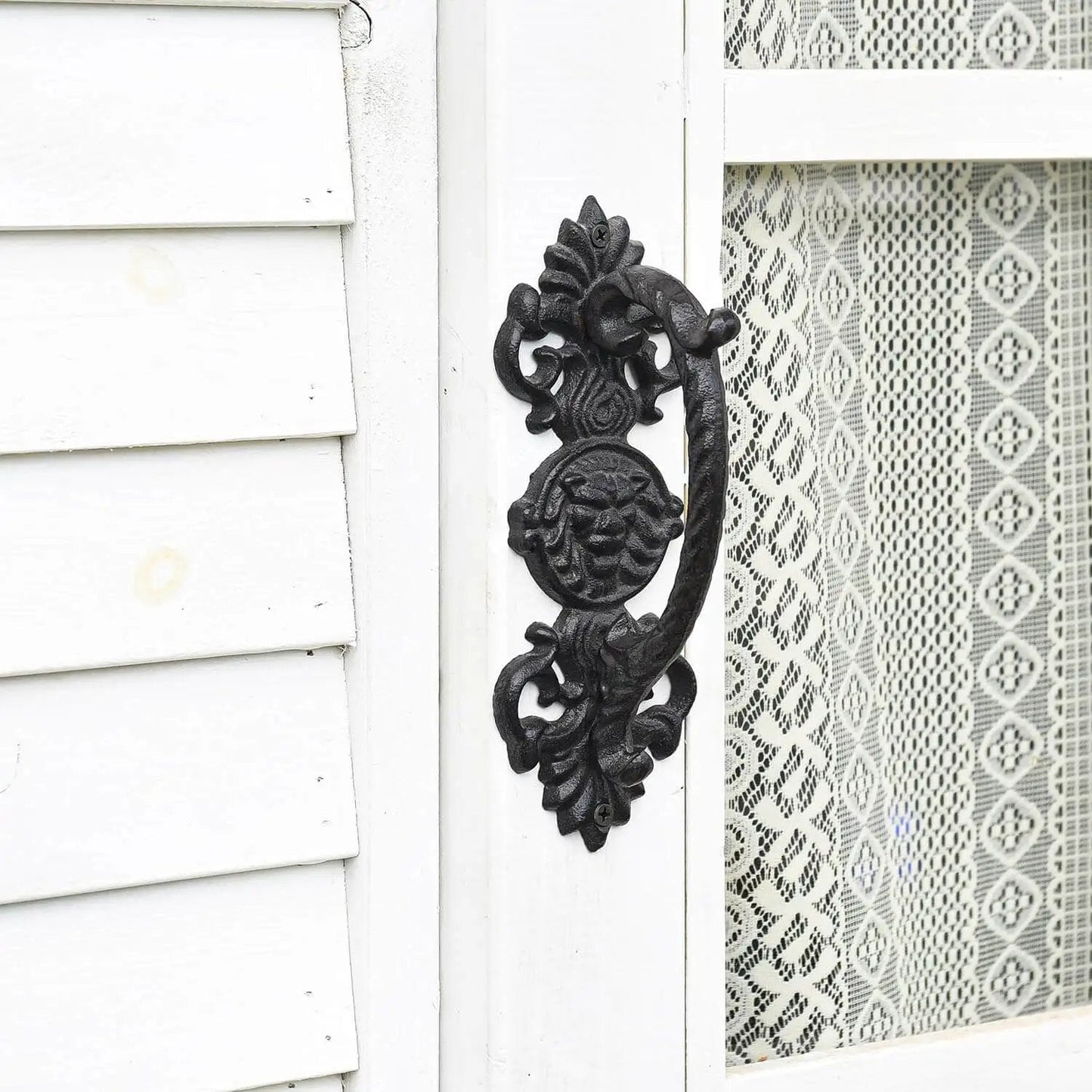 Solid Cast Iron Gate Handles Set 2 Pack Heavy Duty 8.7 Inch Long Barn Door Pulls for Fence Gate on a white door with lace panel.