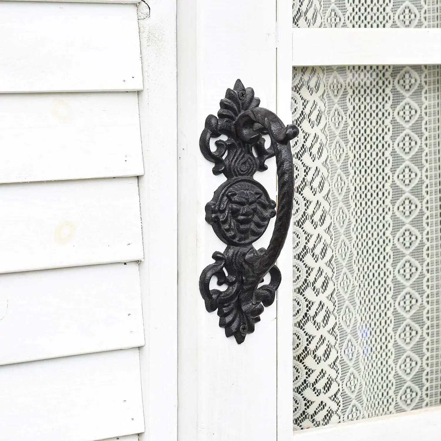 Solid Cast Iron Gate Handles Set 2 Pack Heavy Duty 8.7 Inch Long Barn Door Pulls for Fence Gate on a white door with lace panel.