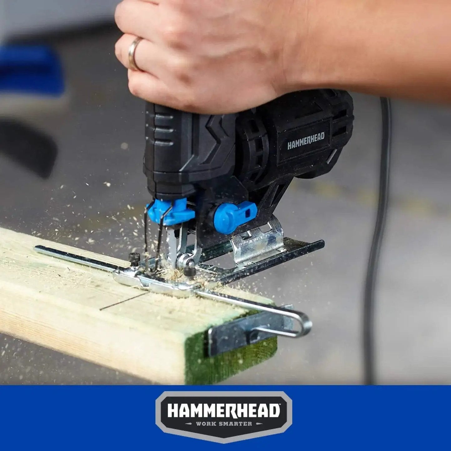 Powerful 4.8 Amp Jig Saw For Woodworking With Three Quarters Inch Stroke Includes Two Wood Cutting Blades Variable Speed Control And Four Stage Orbital Function With Brake For Smooth Precise DIY Wood Cutting By Hammerhead HAJS048 being used to cut wood with precision.