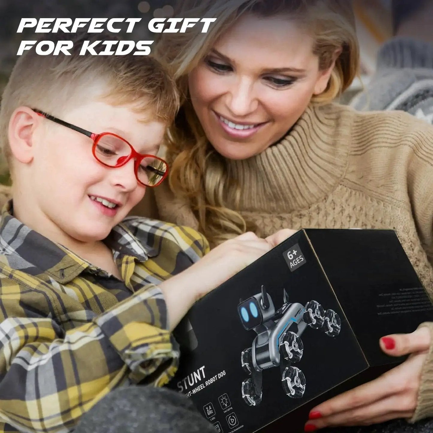 Child with adult holding box of Dynamic Eight Wheel Robot Dog RC Stunt Car With Gesture Sensing Remote Mecanum Wheels For 360 Degree Mobility