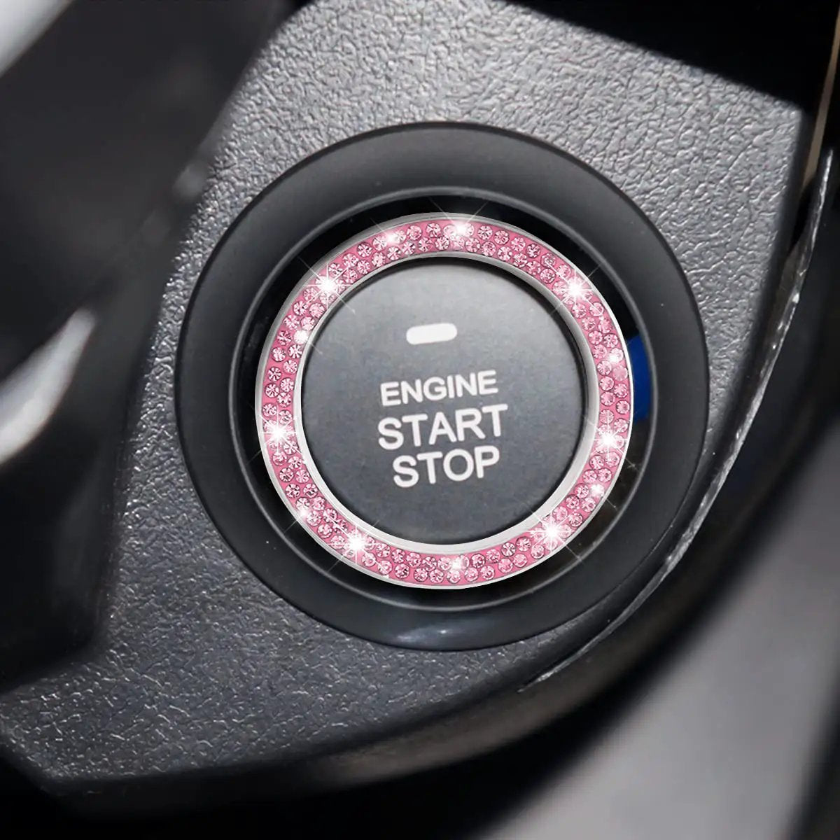 Close-up of Pink Car Start Button Bling Ring Set 2 Pack Crystal Rhinestone Decals installed on engine start button.