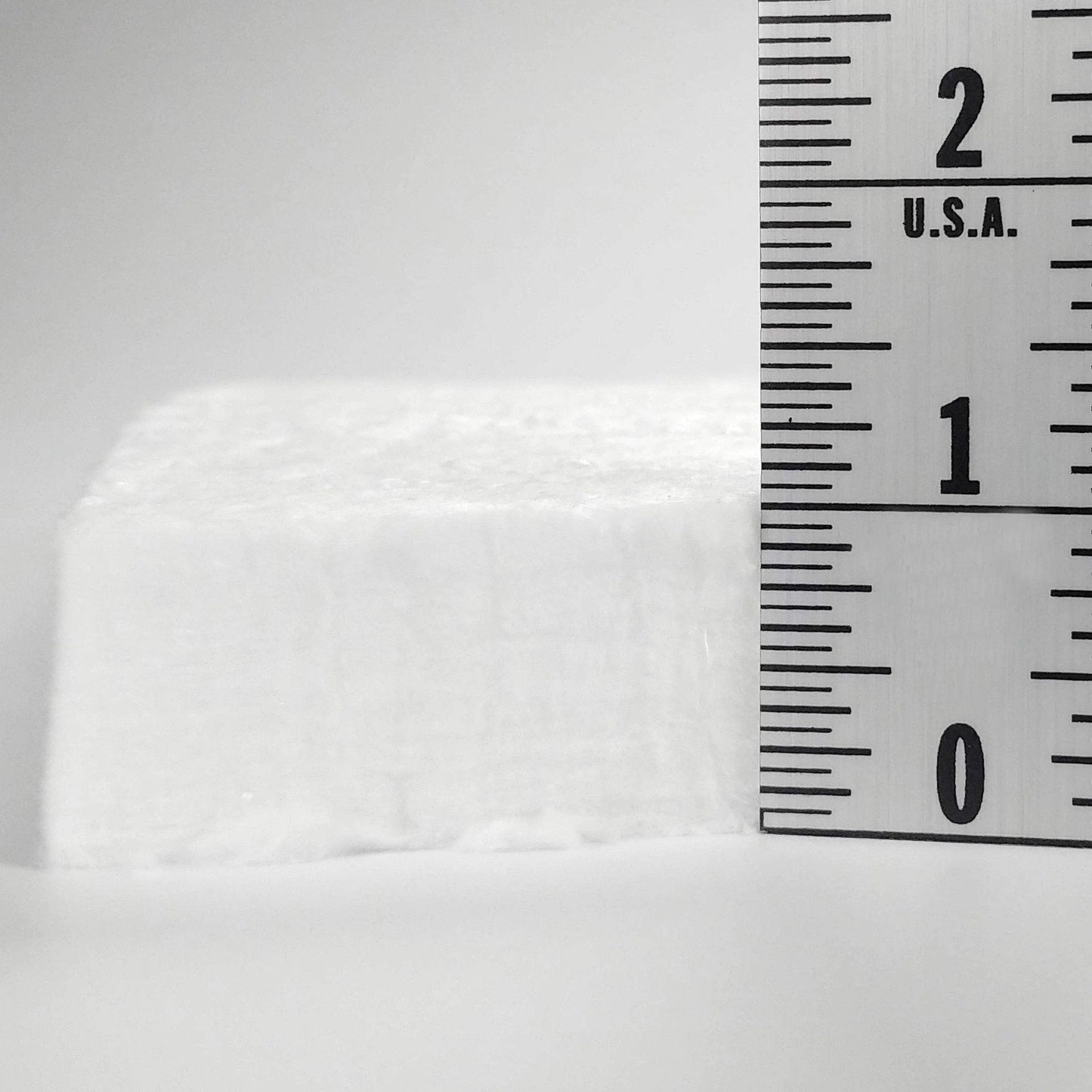 Close-up of Ceramic Fiber Insulation Blanket 1 Inch Thick 16 Inch By 48 Inch Heavy Duty 2400F with ruler for scale.