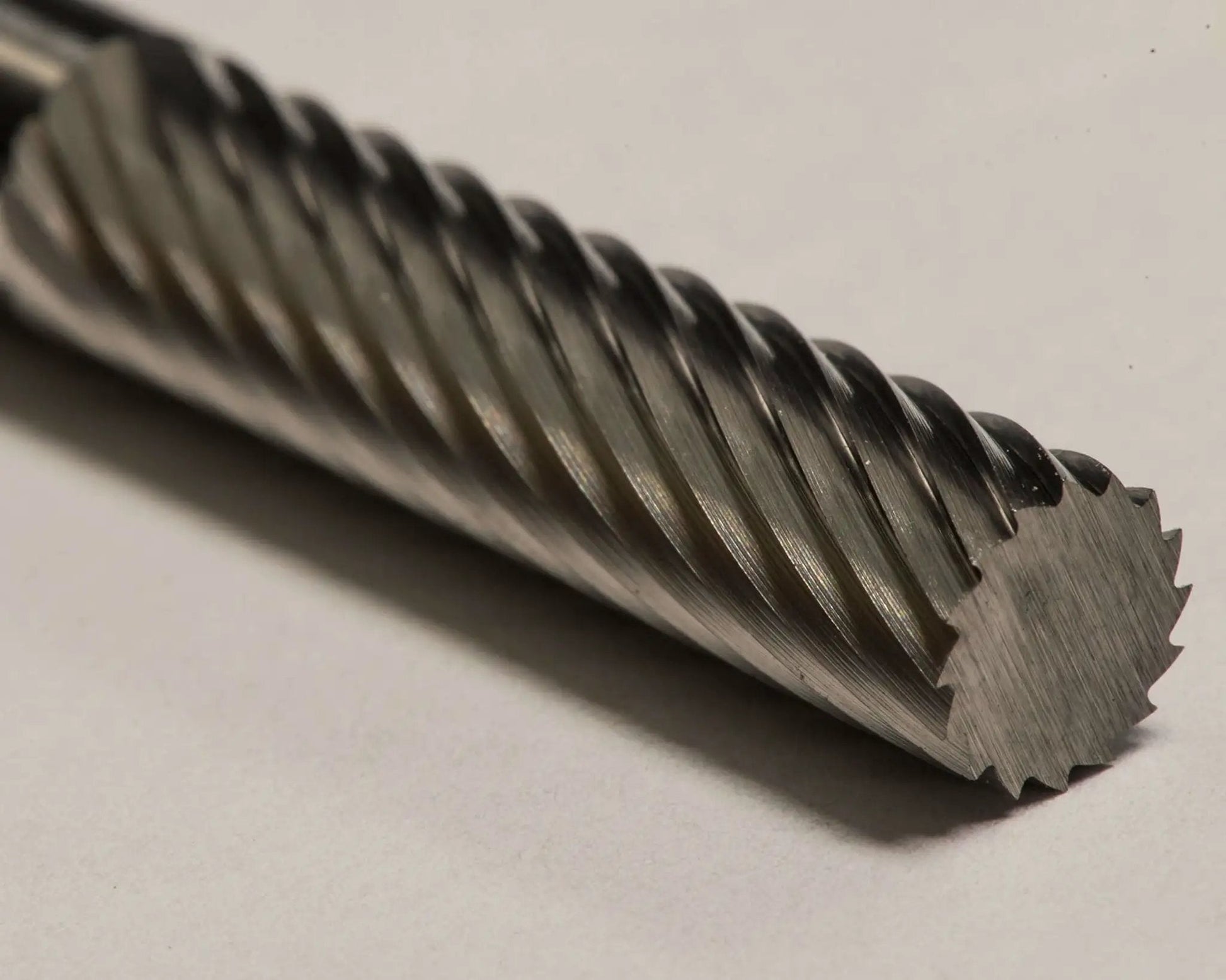 Close-up of SA-1L 1/4 Inch Cylinder Bur Single Cut Solid Carbide showing detailed spiral cutting edges for precision machining.