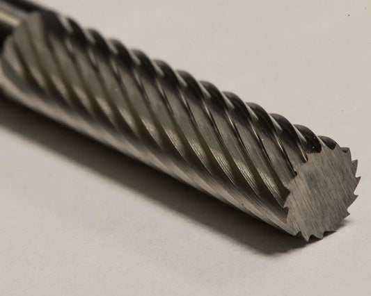 Close-up of SA-1L 1/4 Inch Cylinder Bur Single Cut Solid Carbide showing detailed spiral cutting edges for precision machining.