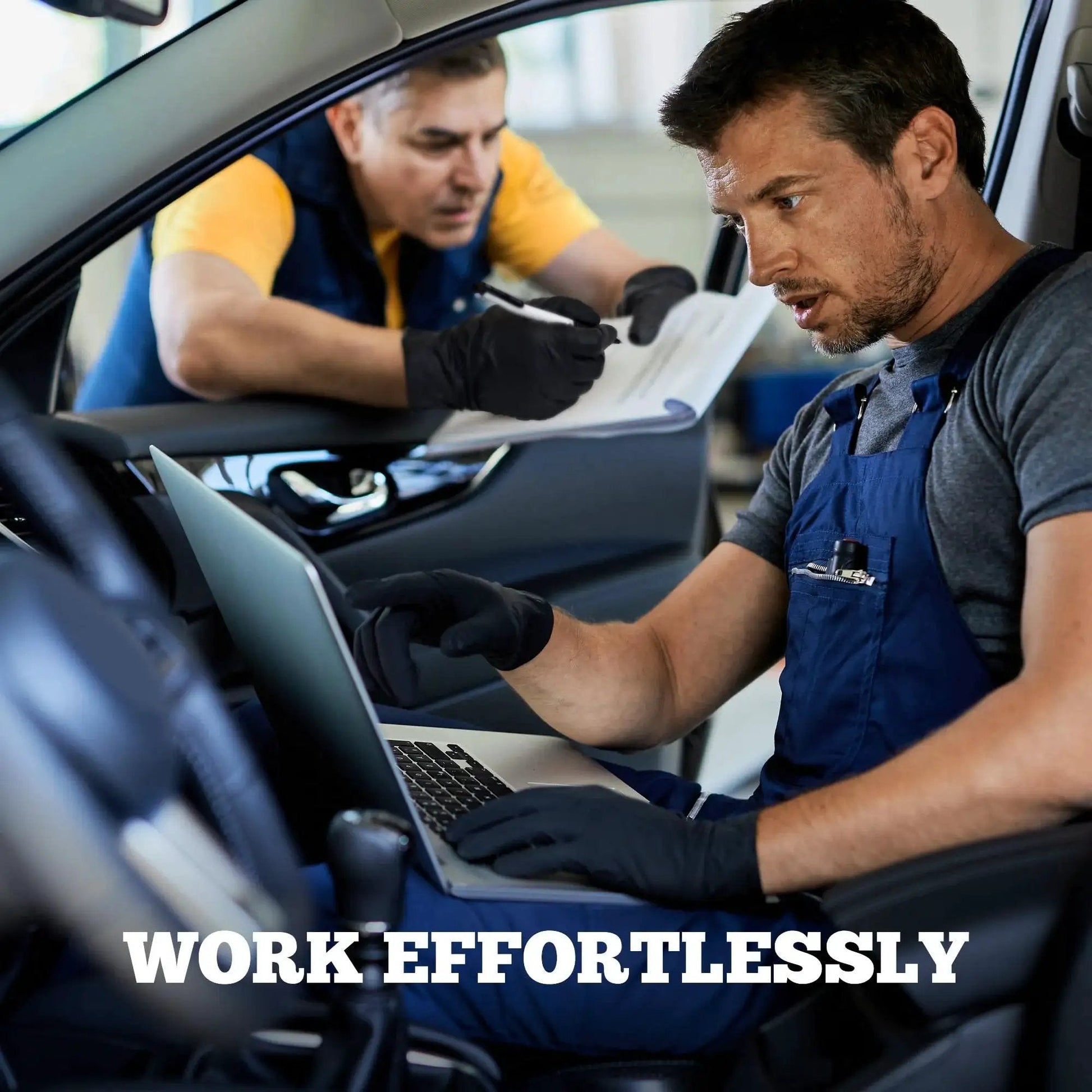Mechanic using laptop in car while wearing Heavy Duty Nitrile Exam Gloves 6 Mil Black XL 100 Count Latex Free For Food Prep