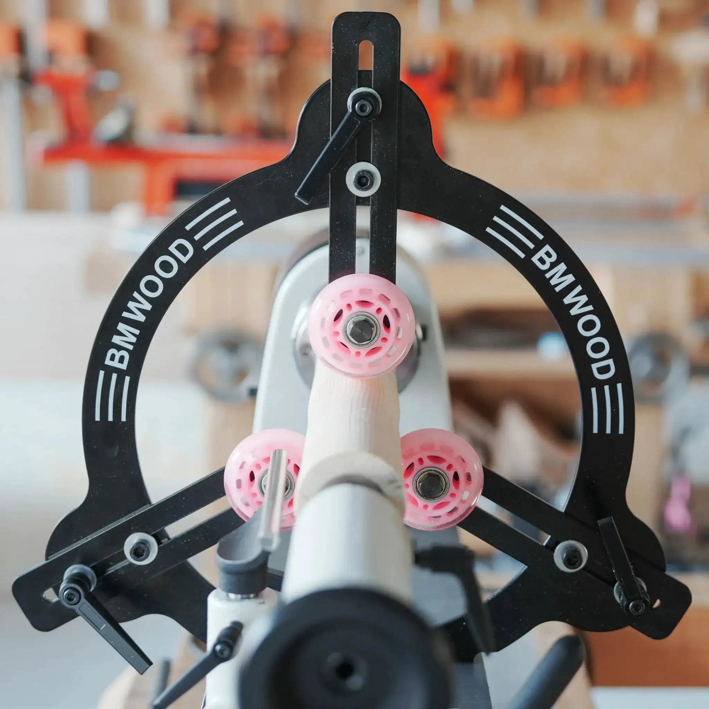 Pro Grade Woodturning Steady Rest For 12 Inch 14 Inch And 16 Inch Swing Lathes Ideal For Spindle Turning Heavy Duty Steel Plate Three Rubber Coated Rollers For Smooth Mobility And Stability Dual Bearing Design in use on a lathe.
