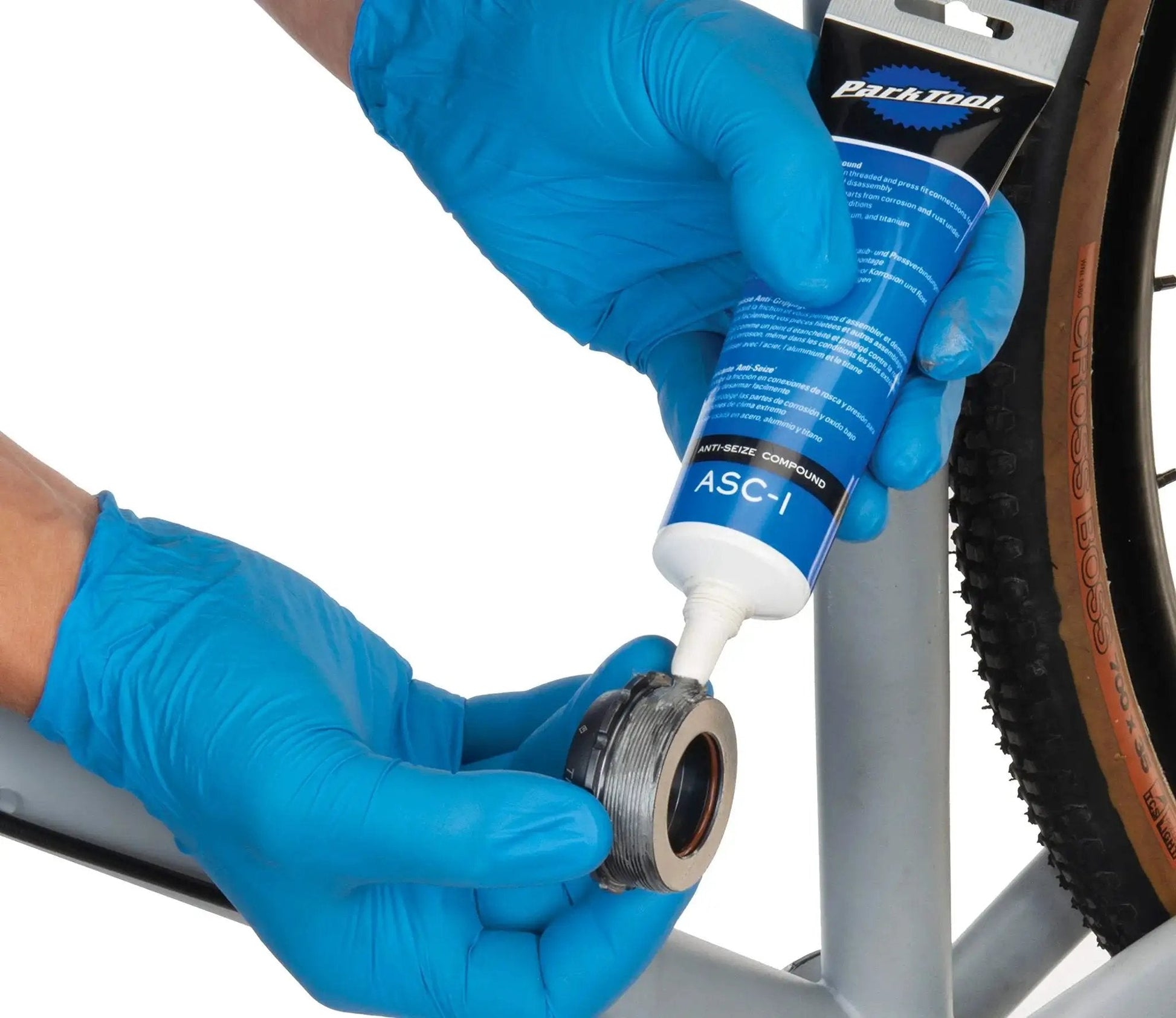 Application of Anti Seize Compound ASC 1 For Bike And Mechanical Assemblies, Reduces Friction In Threads And Press Fits, Protects Parts From Corrosion And Rust In Extreme Conditions, Seals And Guards Steel Aluminum And Titanium, 4 Oz Tube on bike part.