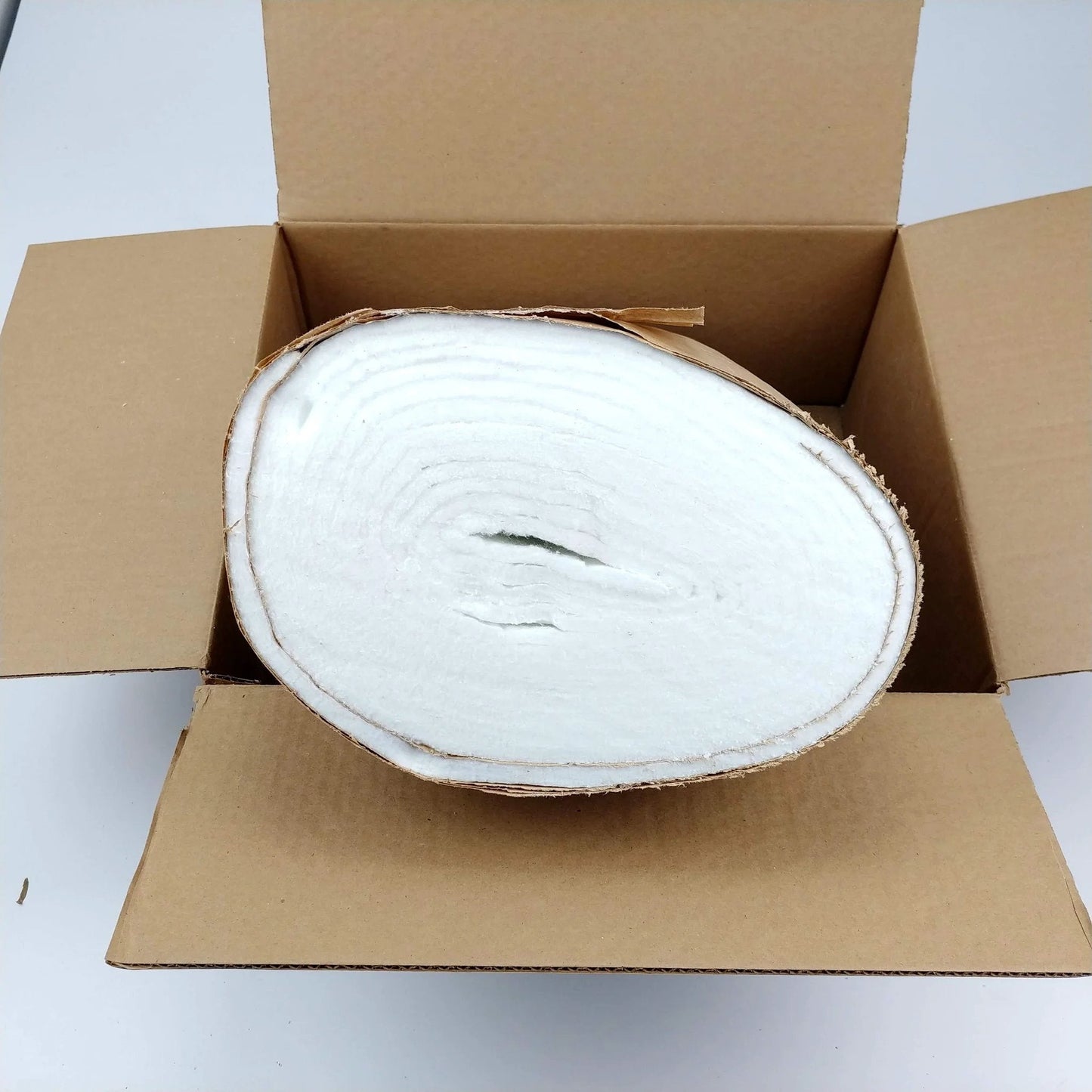 Ceramic Fiber Insulation Blanket 0.25 Inch Thick 16 By 240 Inch Fireproof 2400F in open cardboard box, top view