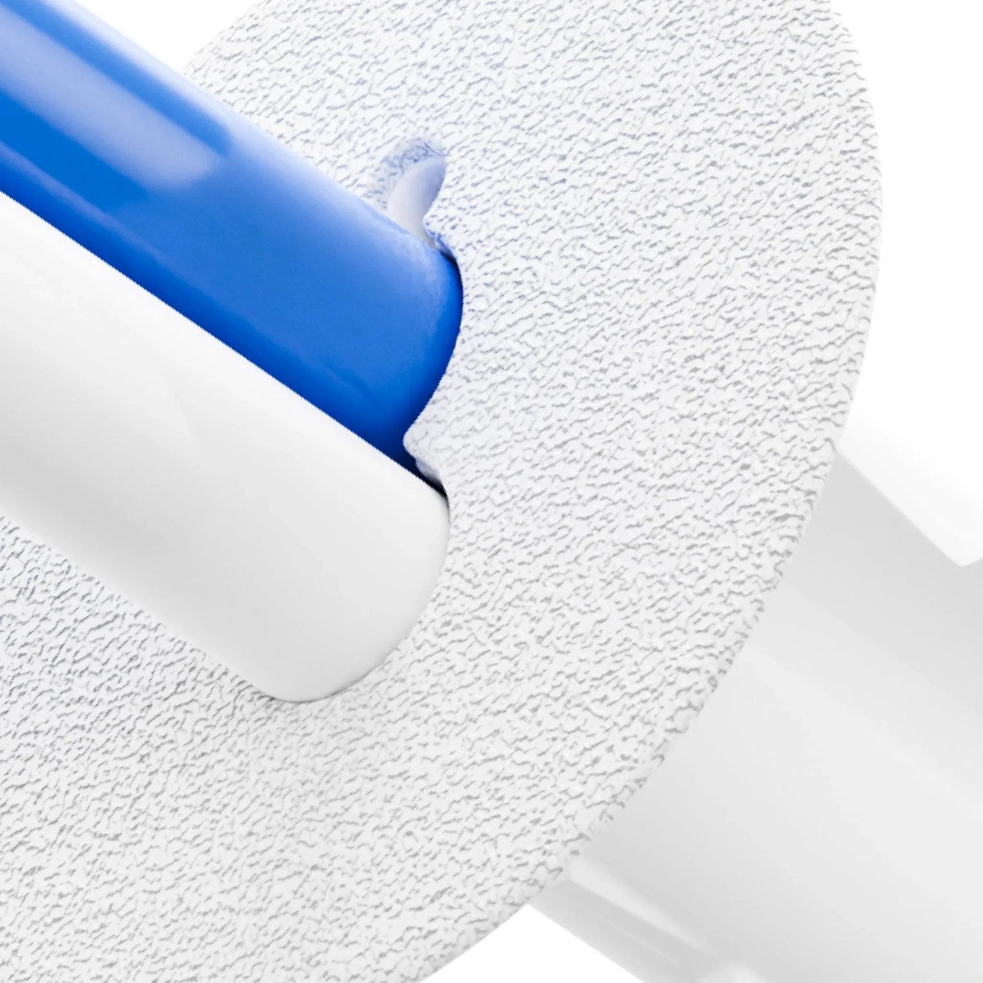 Close-up of Dual Feed Through Bushing For RG6 Coaxial Cable Pass Through Grommet, white with textured finish, showing blue cable