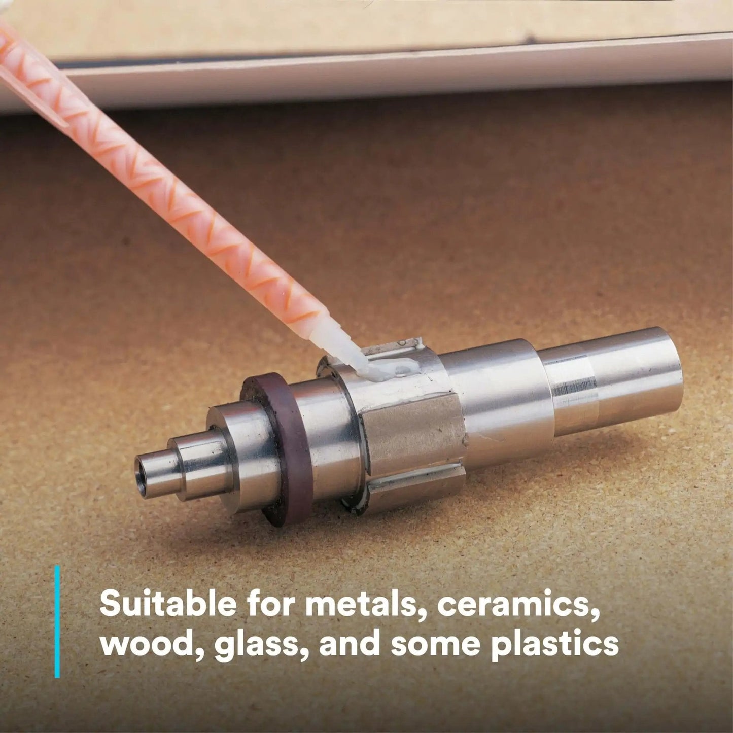DP460NS Epoxy Adhesive White 50 mL Cartridge applied on metal part for high impact bonding in diverse industries