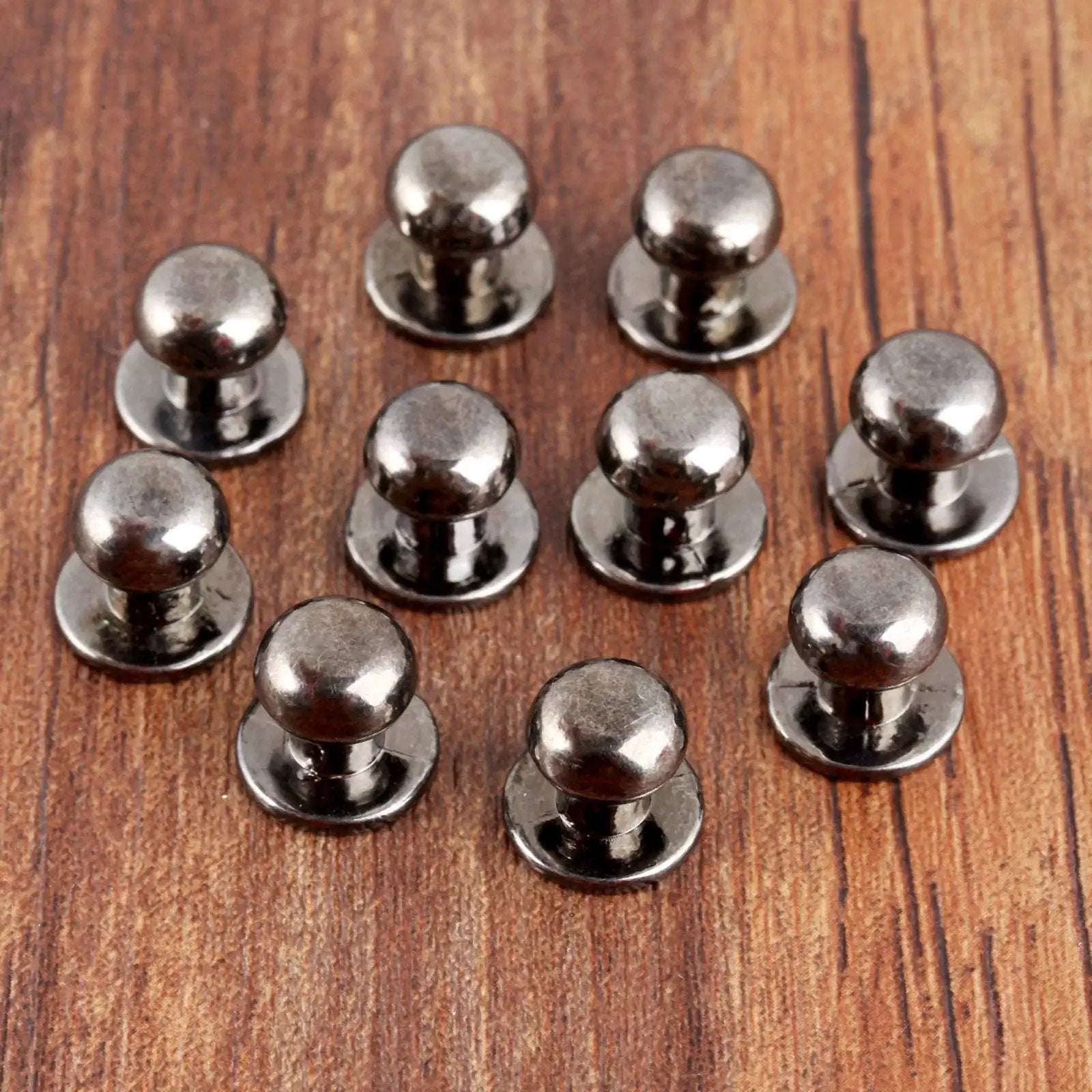10 Pack Mini Drawer Knobs Zinc Alloy Black 0.39x0.43 Inches Durable Small Cabinet Pulls for Dressers Cabinets Closets Jewelry Boxes and Wooden Cases Hardware Accessories Ideal For Home Improvement Projects And Quick Furniture Makeovers displayed on wood surface.