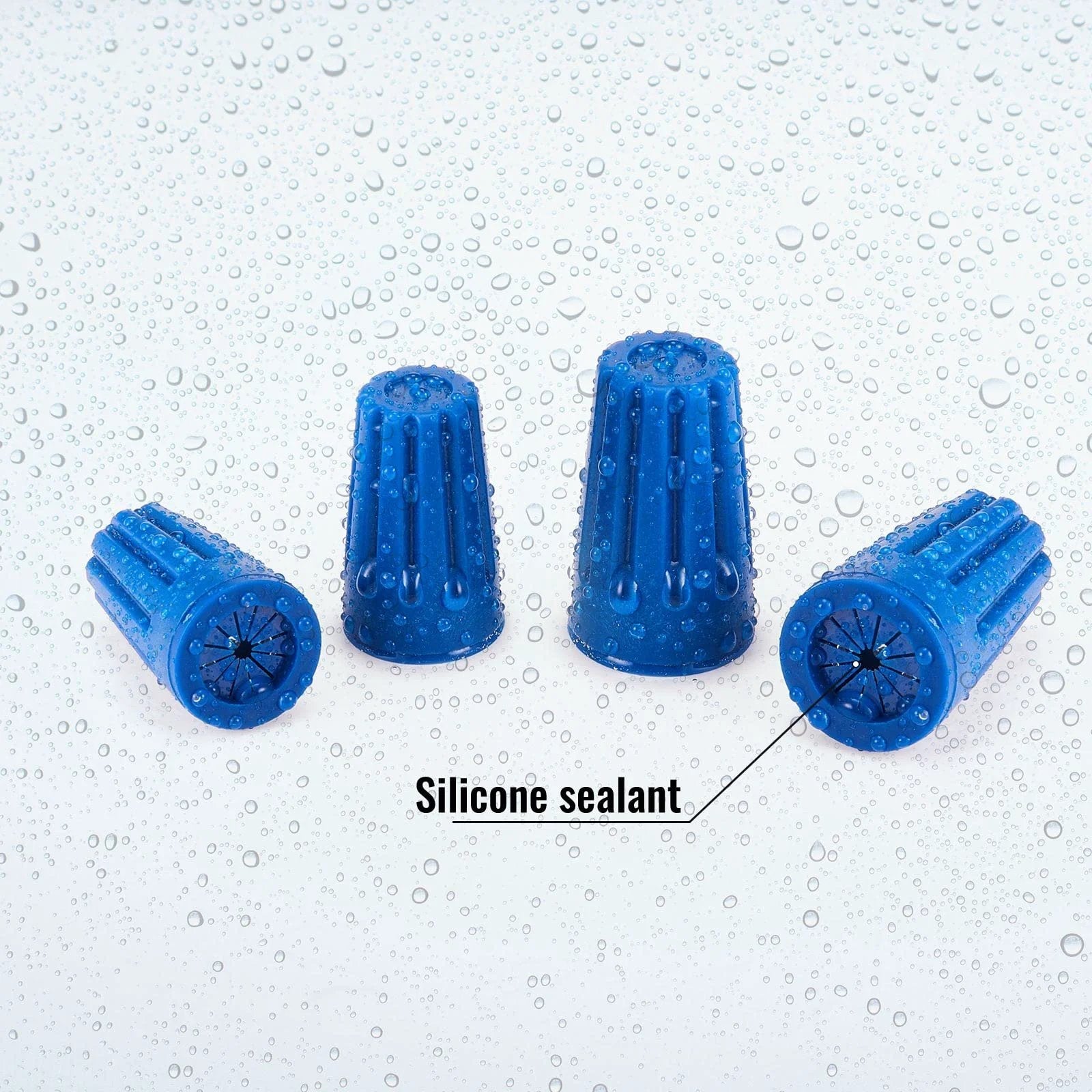 Close-up of blue 40 Pack Waterproof Outdoor Electrical Connector Kit for wet location wiring with silicone sealant visible.