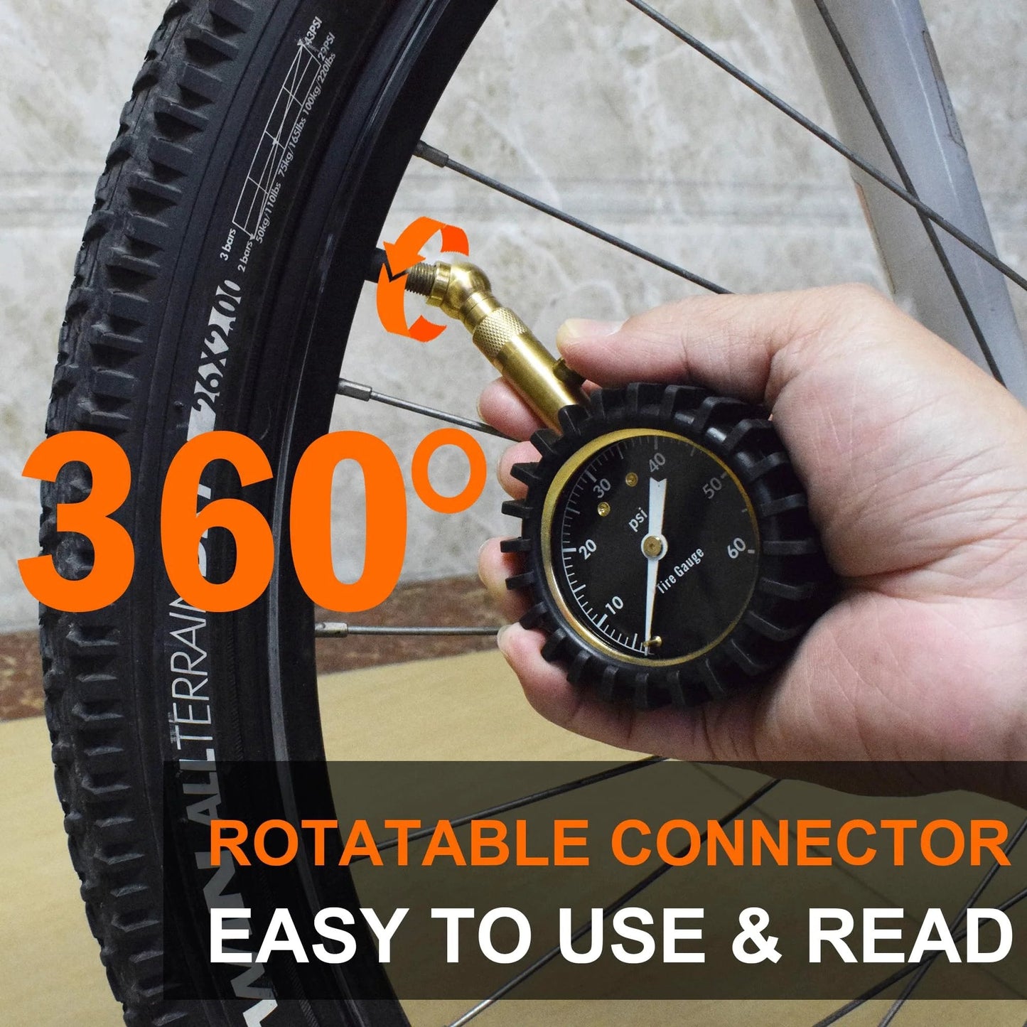 Glowing Dial Tire Pressure Gauge for Cars 60 PSI with Illuminescent 2 Inch Dial measuring a bicycle tire