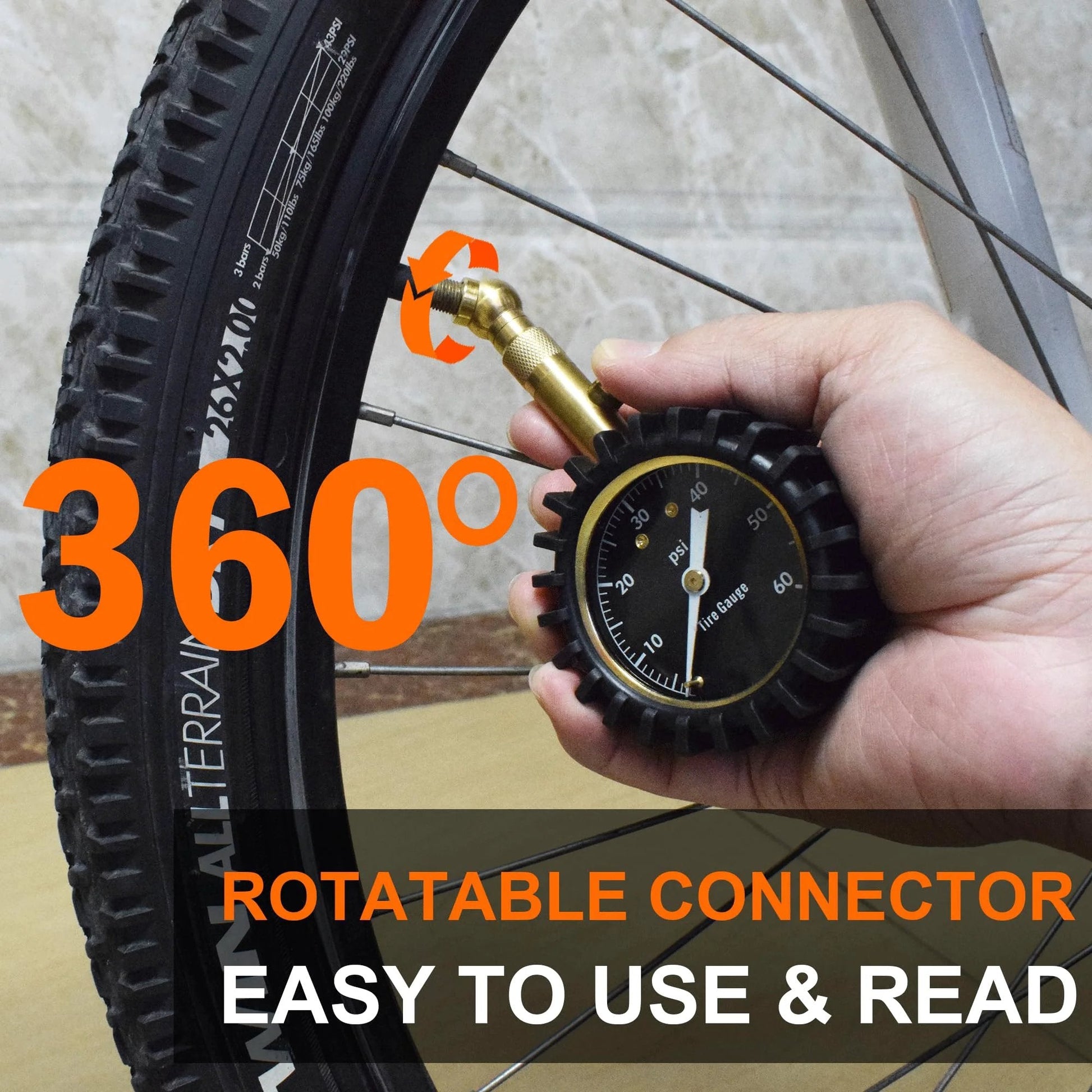 Glowing Dial Tire Pressure Gauge for Cars 60 PSI with Illuminescent 2 Inch Dial measuring a bicycle tire