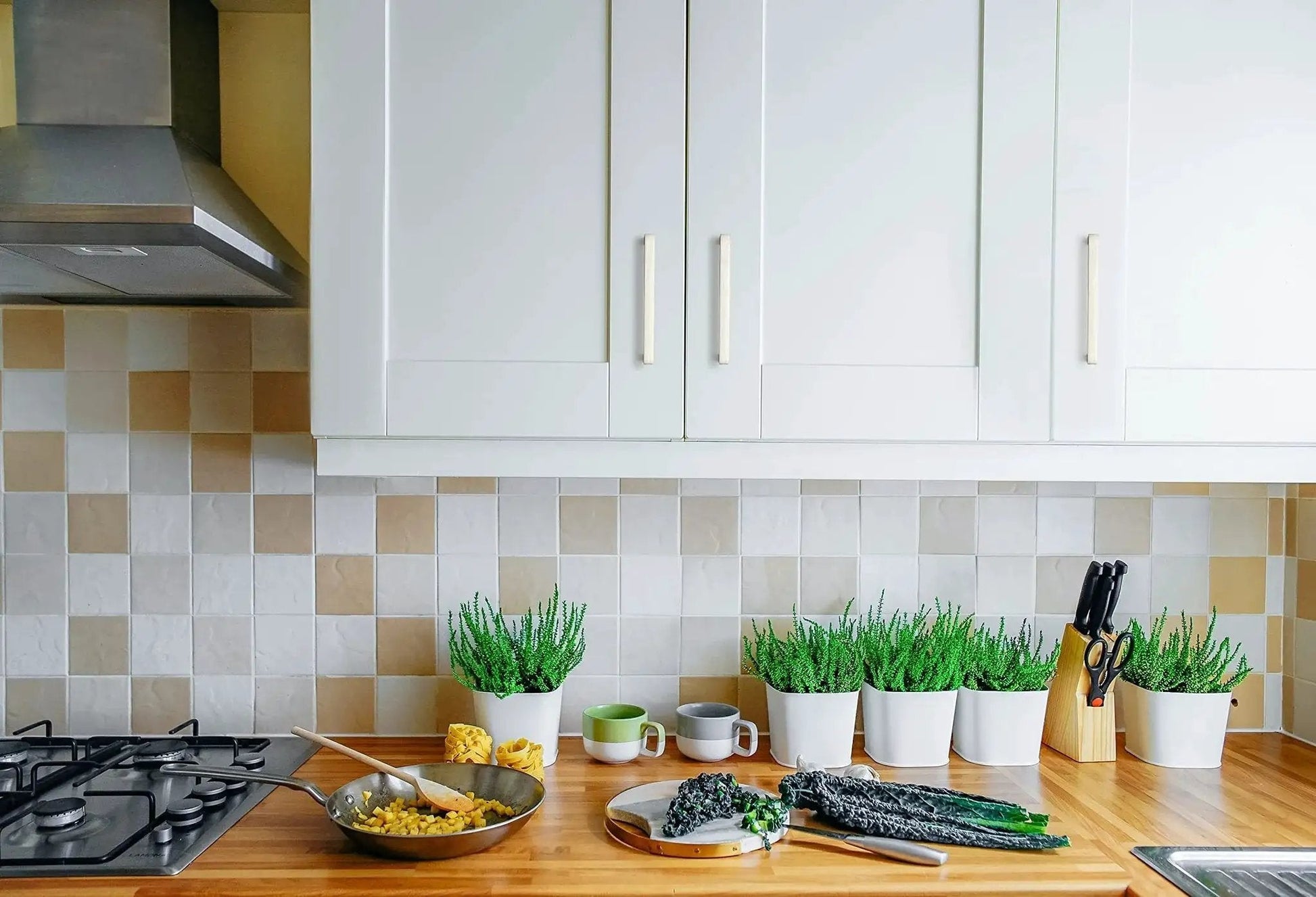 Modern kitchen with white cabinets featuring 25 Pack Solid 5 Inch Square Kitchen Cabinet Handles in Brushed Nickel Pulls for Cabinets and Drawers.