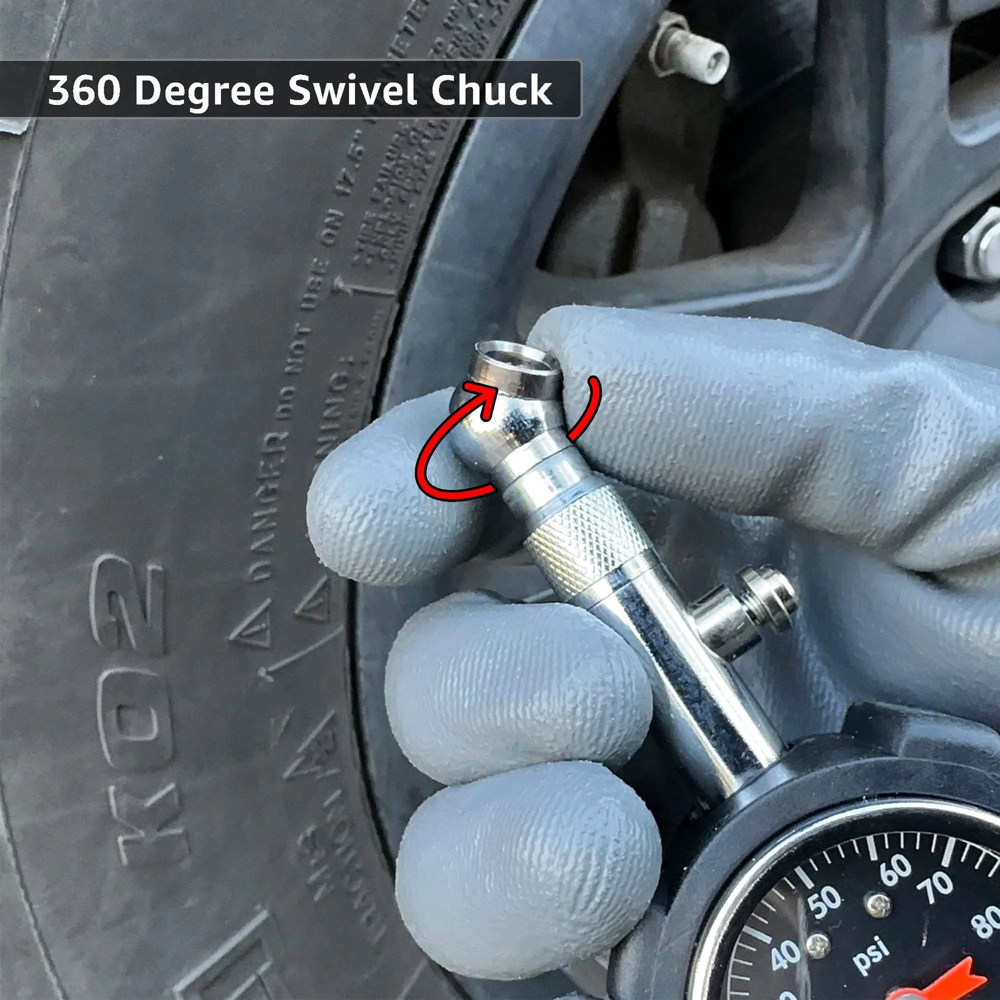Close-up of Deluxe Tire Pressure Gauge For Cars And Bikes With 100 PSI Precision ANSI B40 1 Standard, held against tire valve.