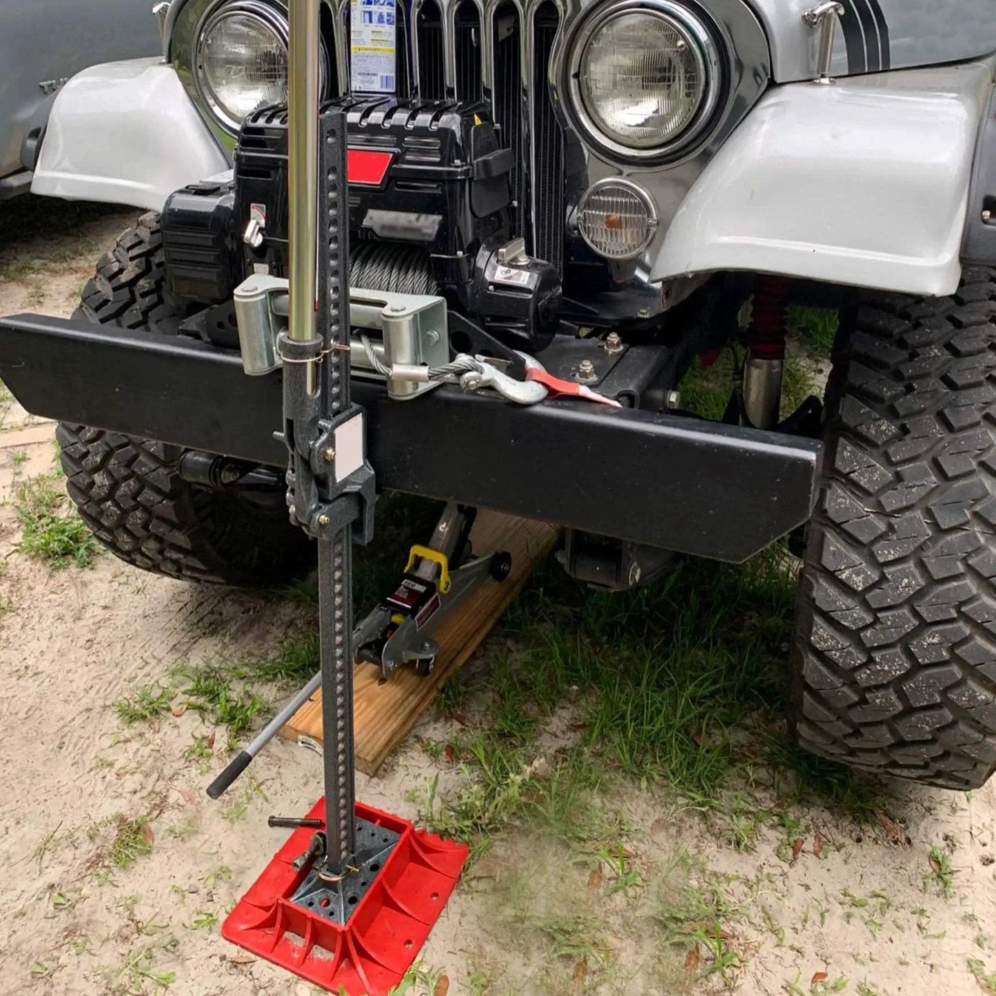 Off Road Base Jack Stand With PP Pad To Alleviate Hoist Sinkage For Most Jacks installed under lifted vehicle.