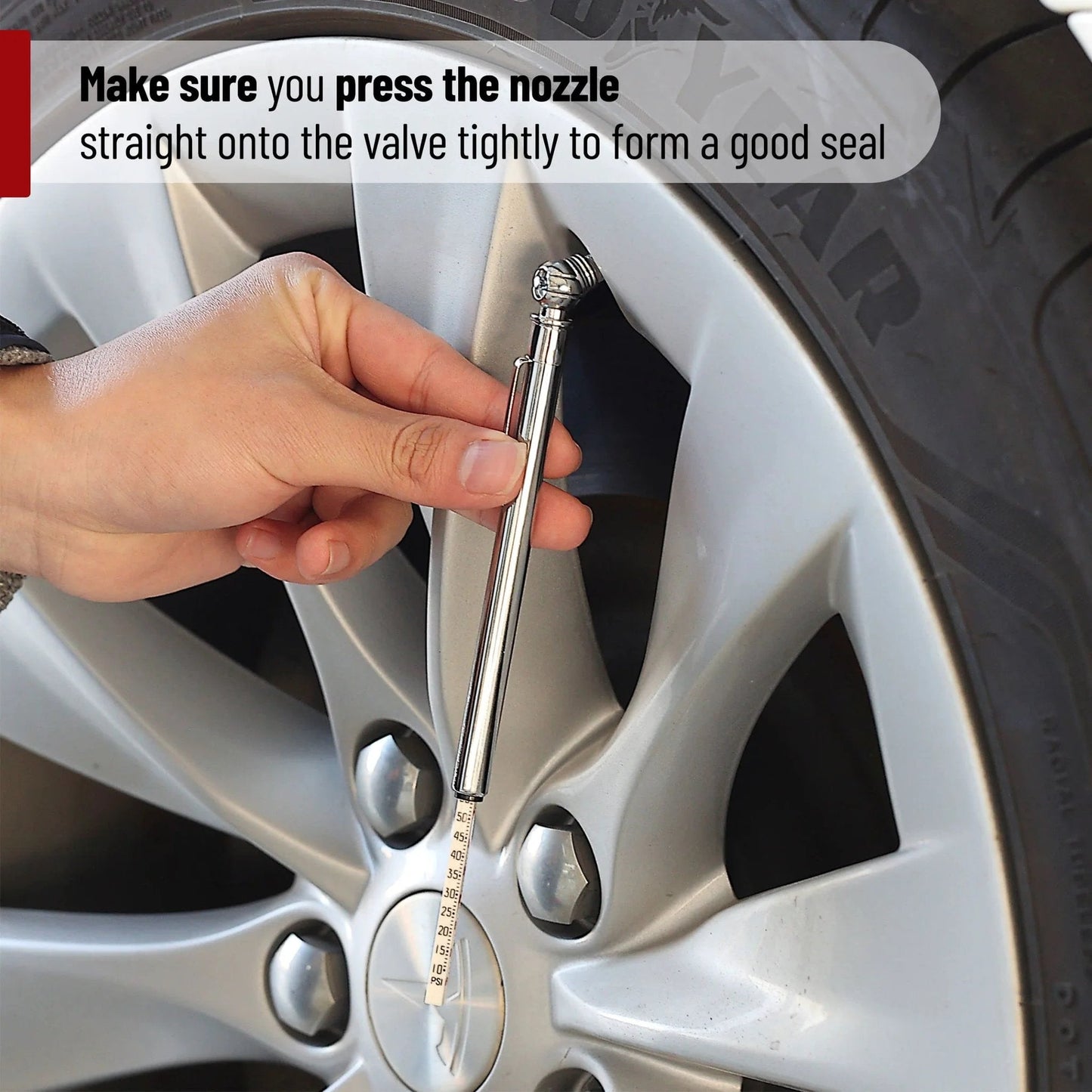 Two Pack Pencil Tire Gauge For Cars 10 To 75 PSI 70 To 550 kPa 0.7 To 5.5 BAR Stainless Steel Construction With Rust And Corrosion Resistant Seal For Valve Stems Highly Accurate Easy Read Budget Friendly being used on a car tire valve stem.