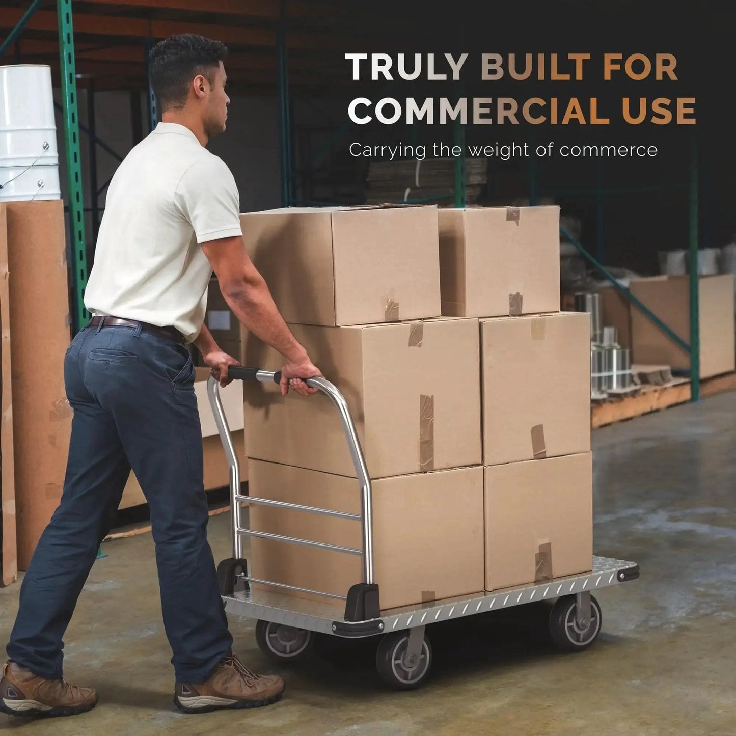 Man pushing Heavy Duty 2200 Pound Capacity Foldable Push Cart Dolly with boxes in a warehouse