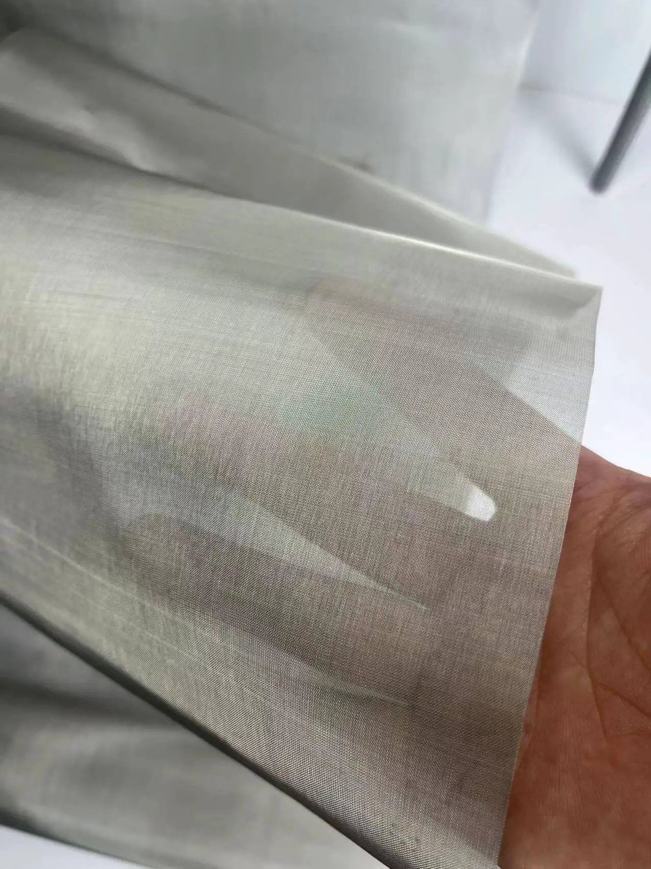 Close-up of Ultra Fine 180 Mesh Stainless Steel Screen With 0.06mm Wire Diameter For Precise Filtration And Sieving In Gardening.