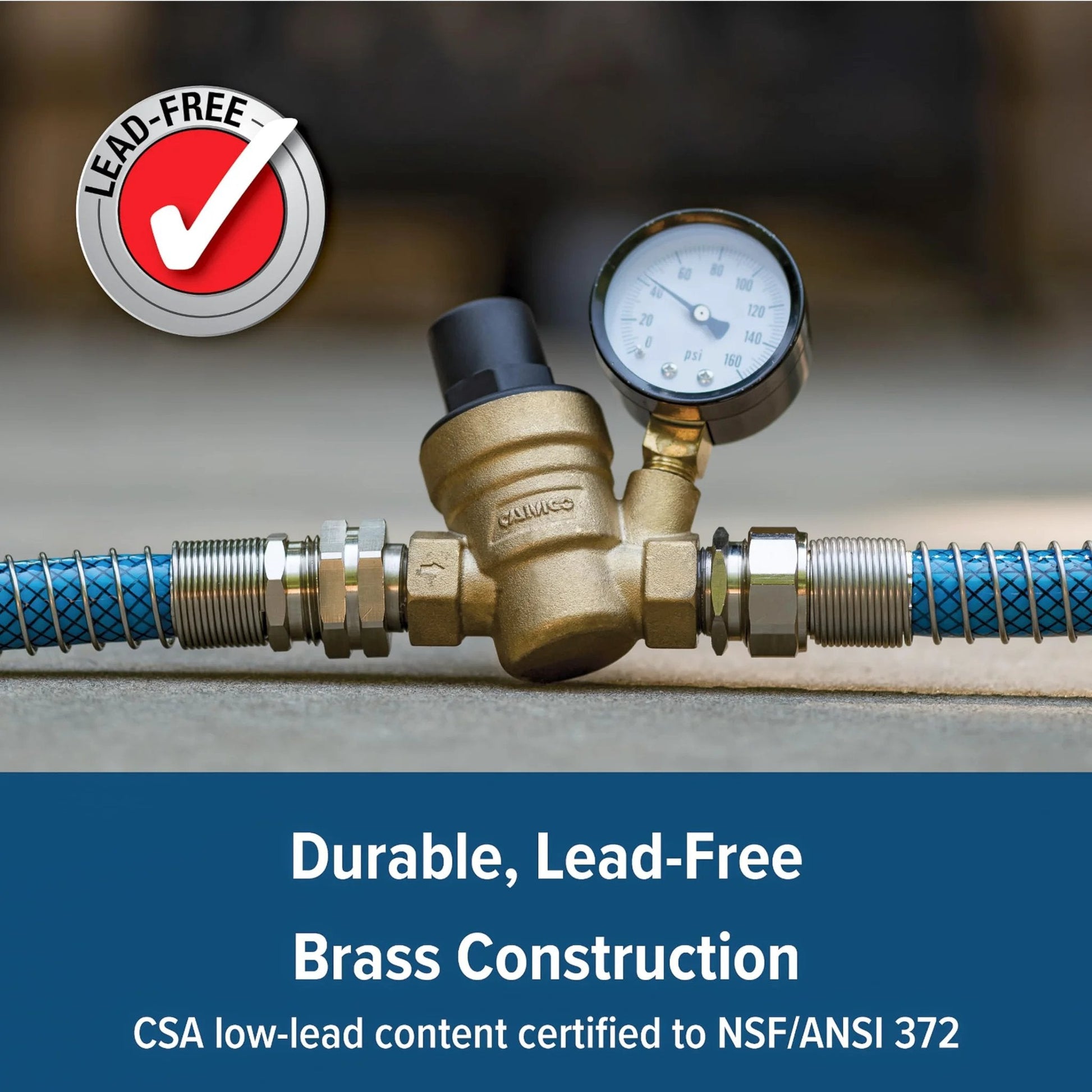 Adjustable Brass Water Pressure Regulator for RV and Marine Use With Standard Garden Hose Threads for Easy Hookup Helps Prevent Damage to Appliances Plumbing Fixtures and Hoses Camco 40058, close-up of brass construction with gauge and hose connections.