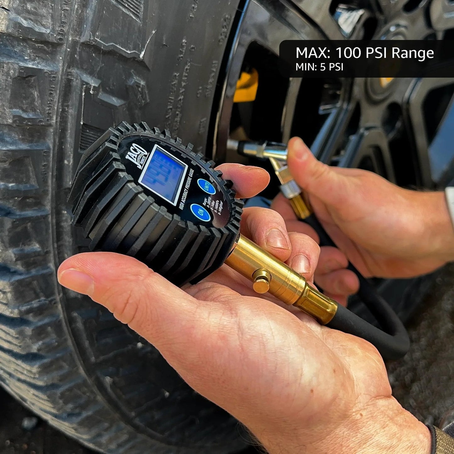 ElitePro Digital Tire Pressure Gauge Pro Grade Accuracy Up To 100 PSI With Dual Sensors Calibrated To ANSI 2A Standards 0.50 Percent FS 0.10 PSI Readout used on a car tire