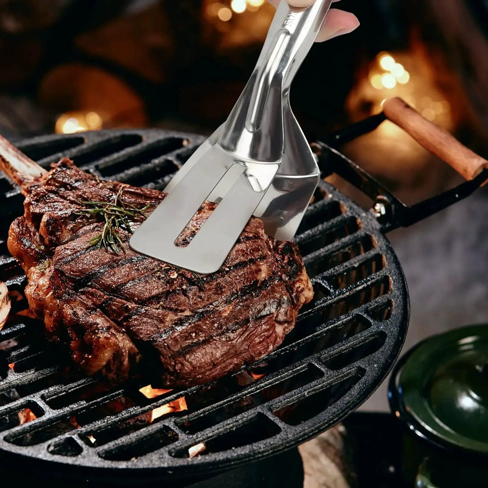 Multifunction 11 Inch Premium Stainless Steel Tongs 3 In 1 Gripper Flip And Scraper lifting steak on grill