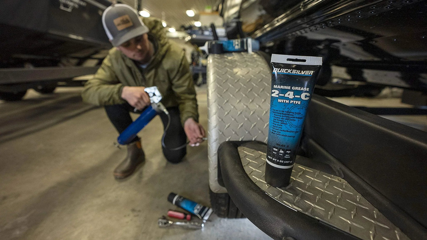 Image of 2-4-C Marine Grease With PTFE Teflon For Boats And Cables, Multi Purpose Lubricant tube, in a boat garage.