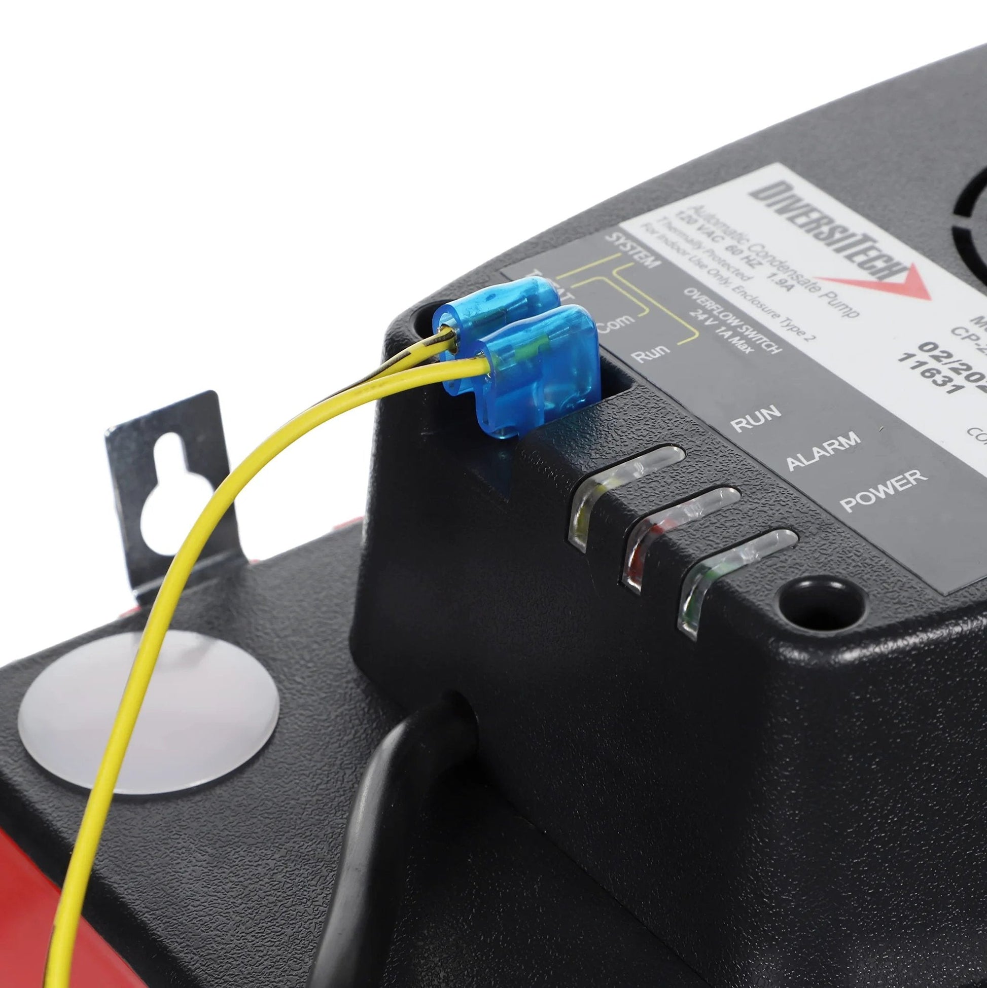 Close-up of Ultra Series Automatic Condensate Pump control panel, showing wires and control labels for HVAC and refrigeration equipment.
