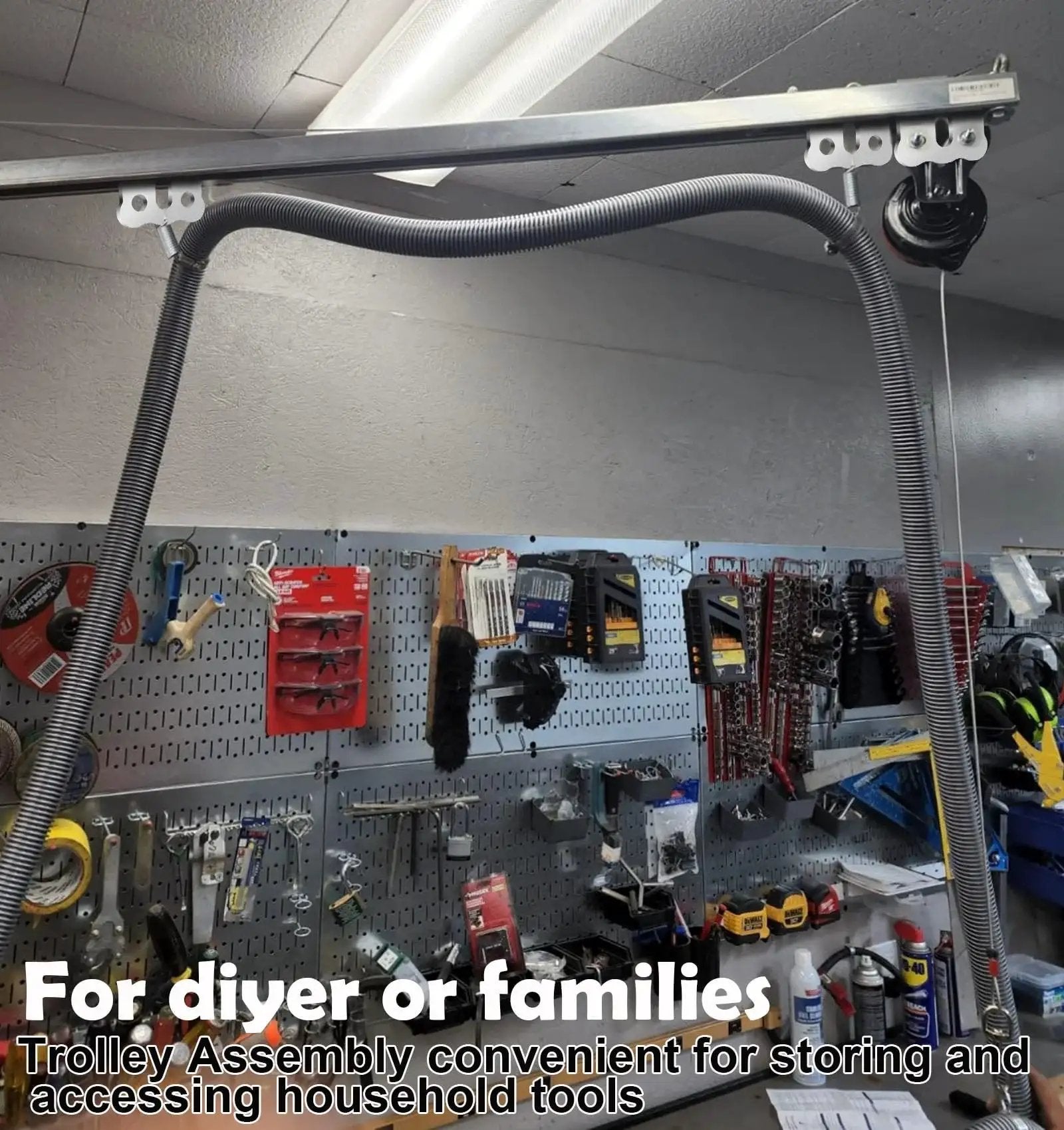 Heavy Duty Four Wheel Hoist Trolley Assembly with Strut Channel Rollers in a workshop setting.