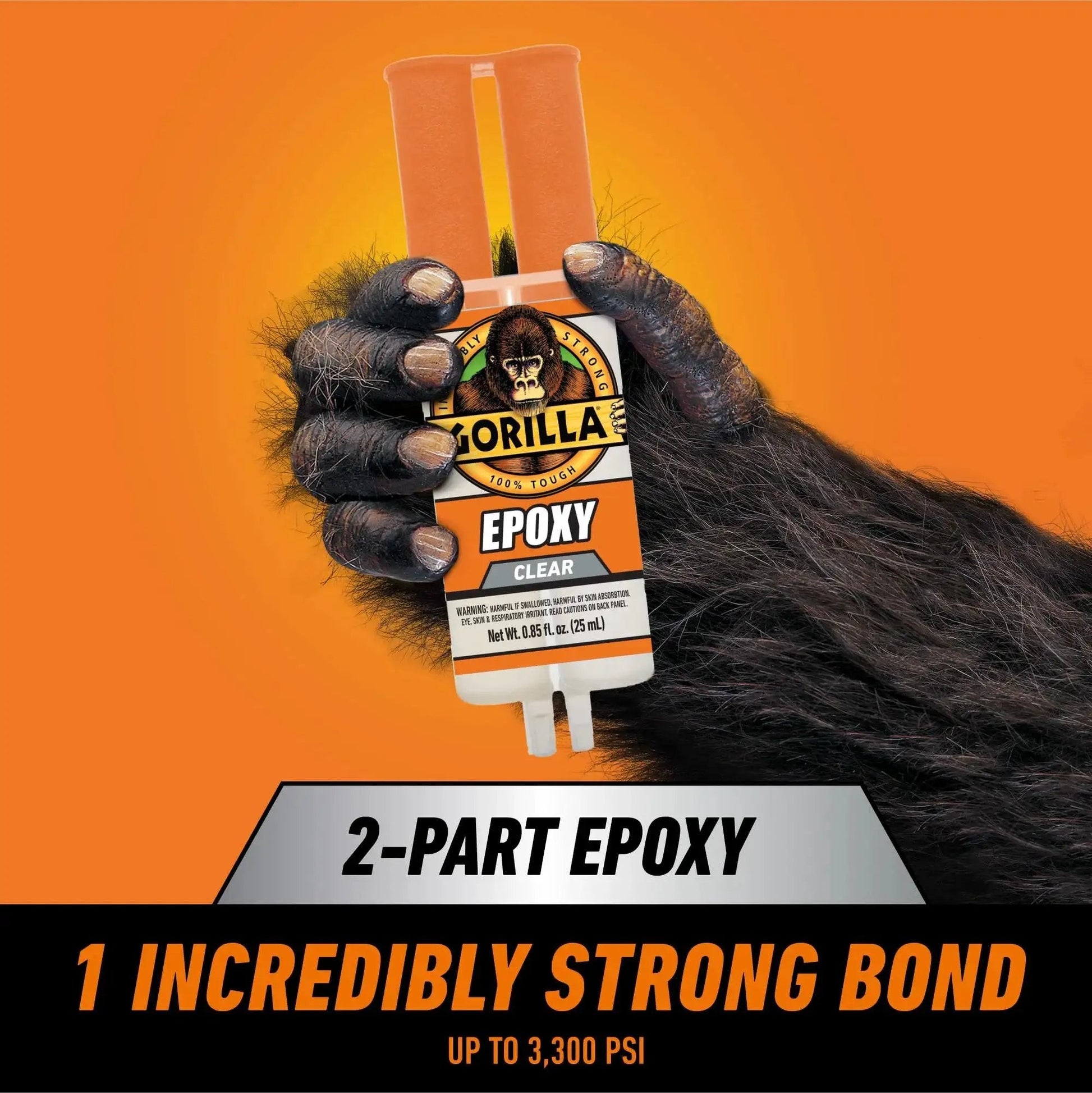 Clear 2 Part Epoxy Syringe, 0.85 Oz, 5 Minute Fast Set, Strong Bond held in a gorilla hand against orange background.