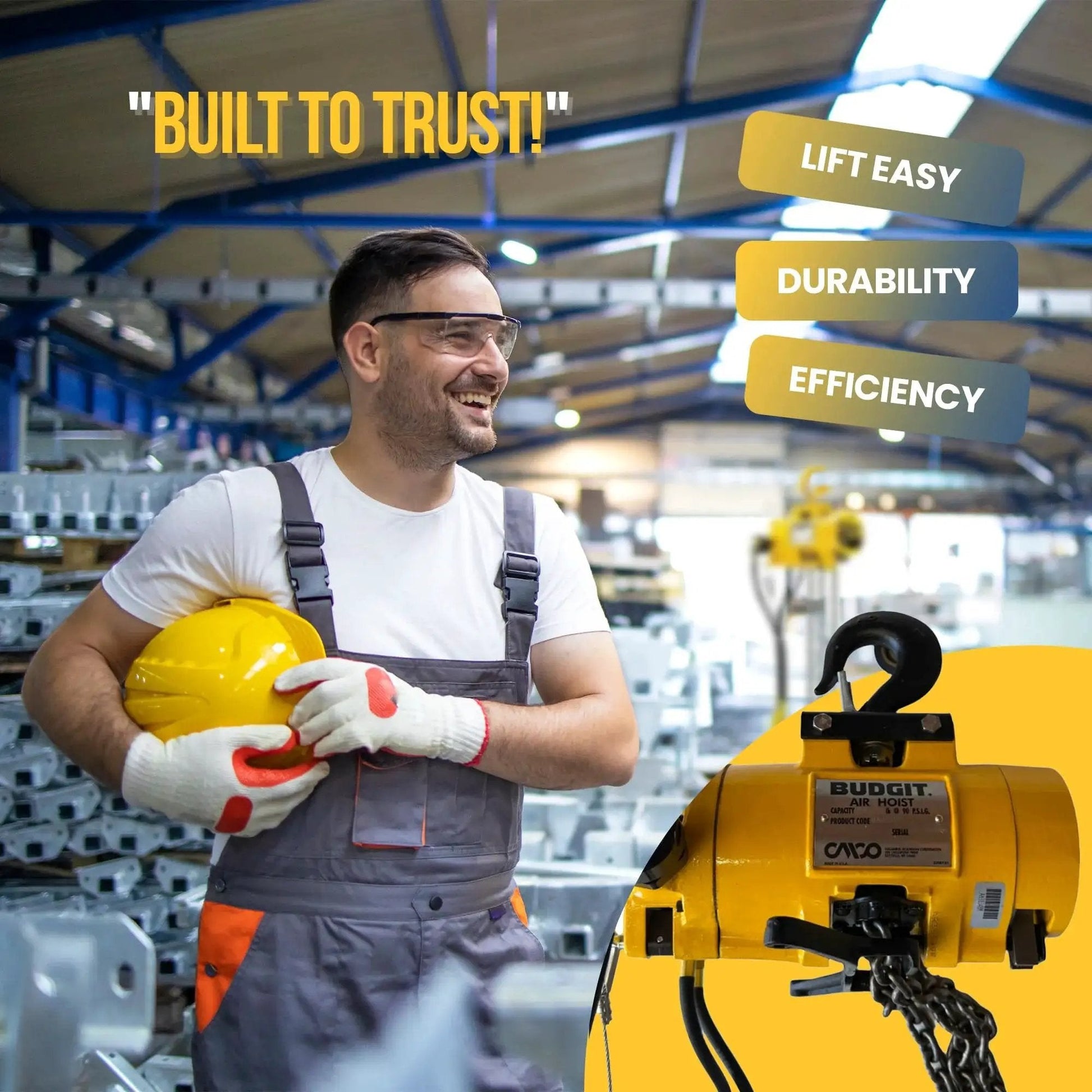 Worker in a factory holding a helmet next to a Half Ton Pneumatic Air Hoist With 20 Foot Lift And Pendant Throttle Control