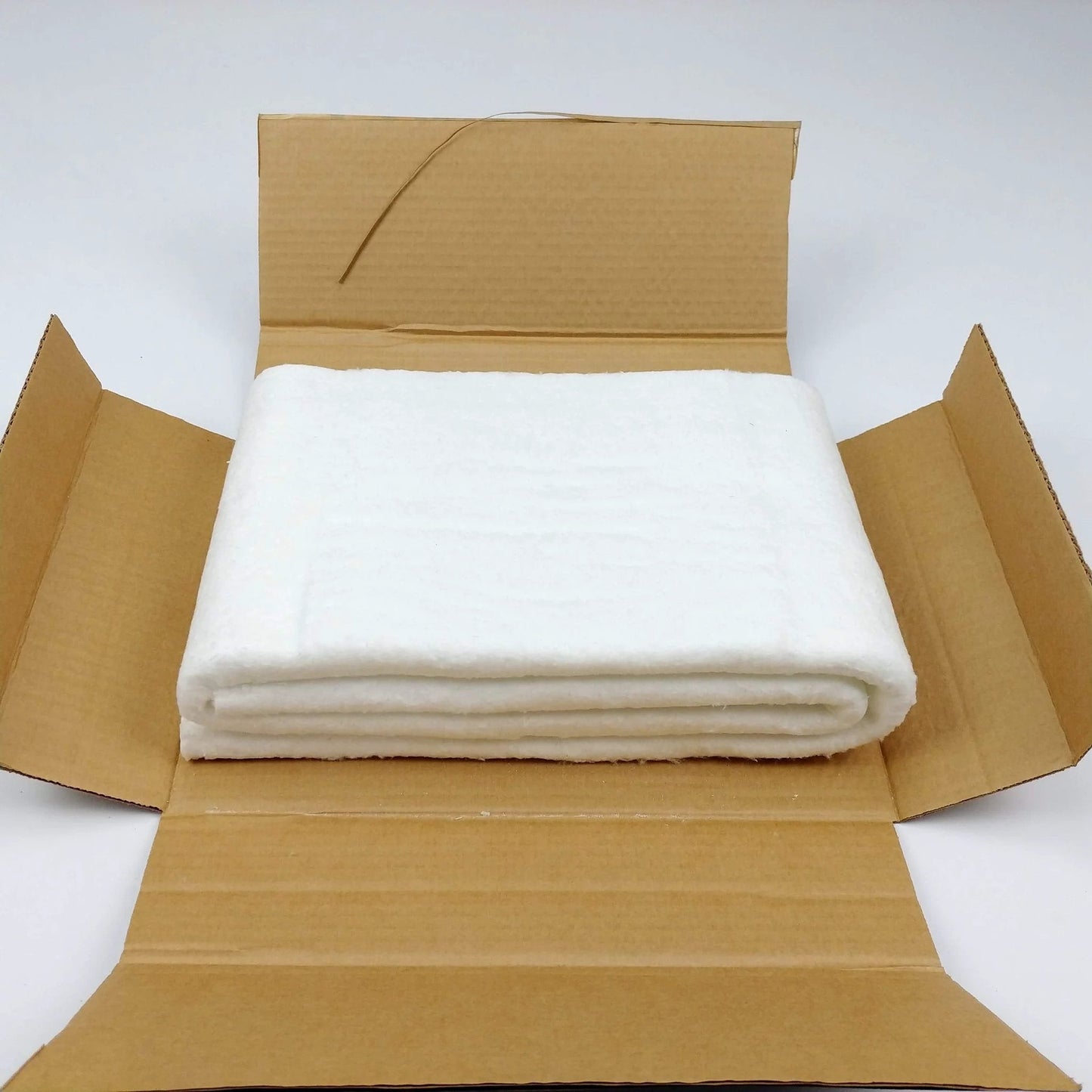 Ceramic Fiber Insulation Blanket Heavy Duty One Quarter Inch Thick 16 Inch By 48 Inch 2400F Fireproof Shield shown in open box