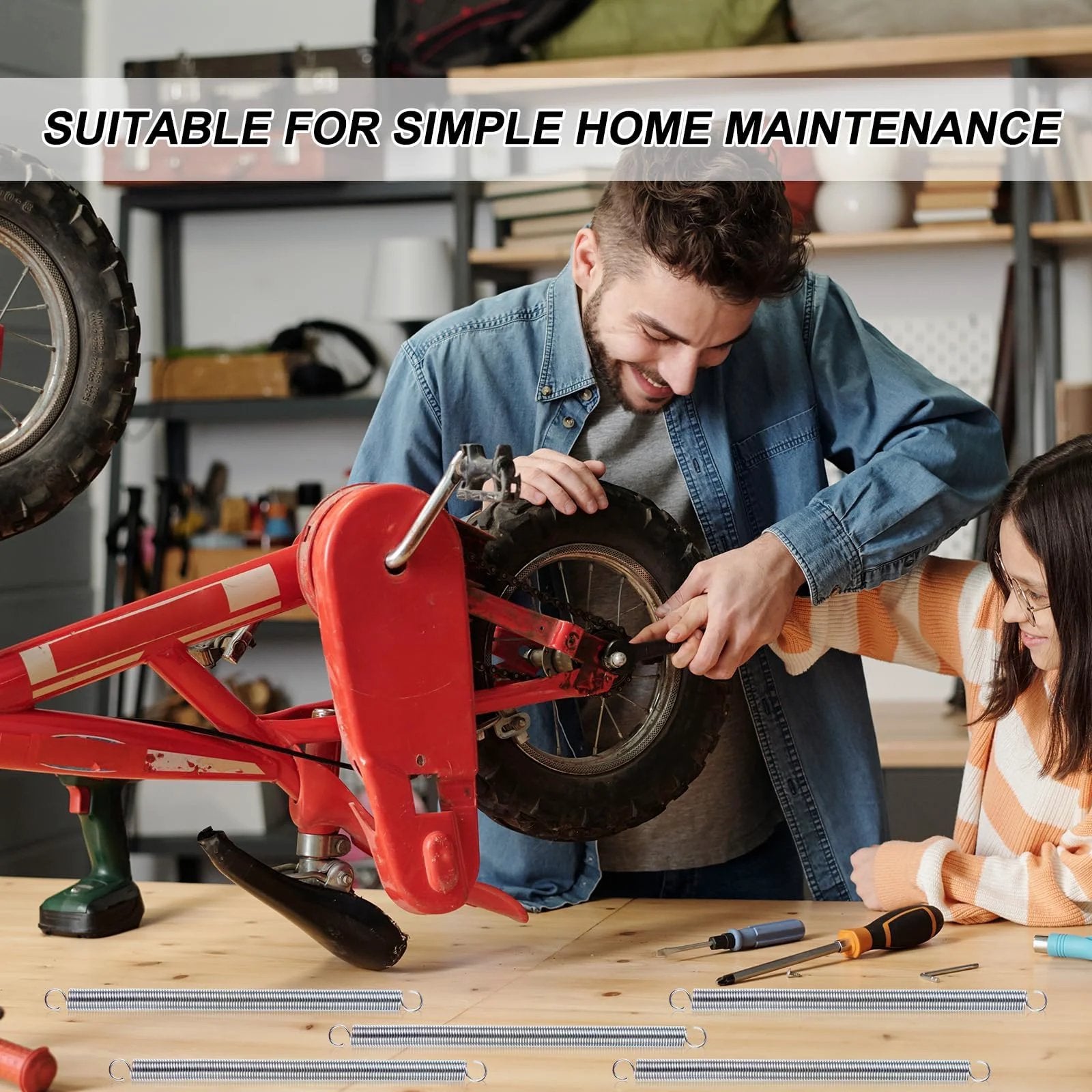 Person repairing bicycle wheel with tools on wooden table; suitable for home maintenance projects.