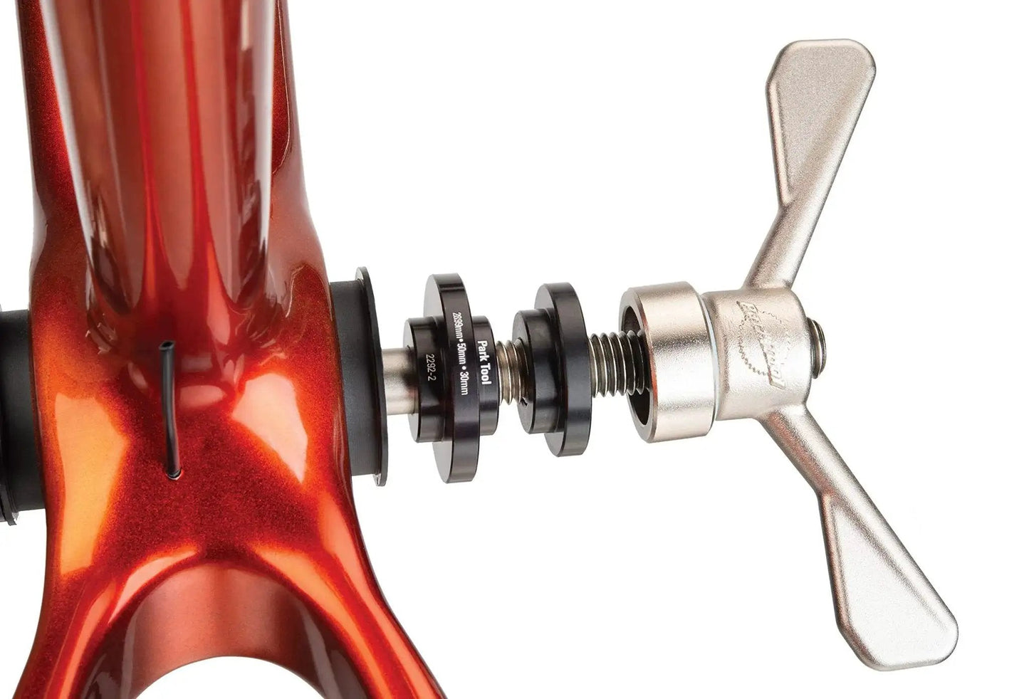 Bottom Bracket Bearing Press Set With Quick Release for installation, shown on bike frame, precision machined bushings included.
