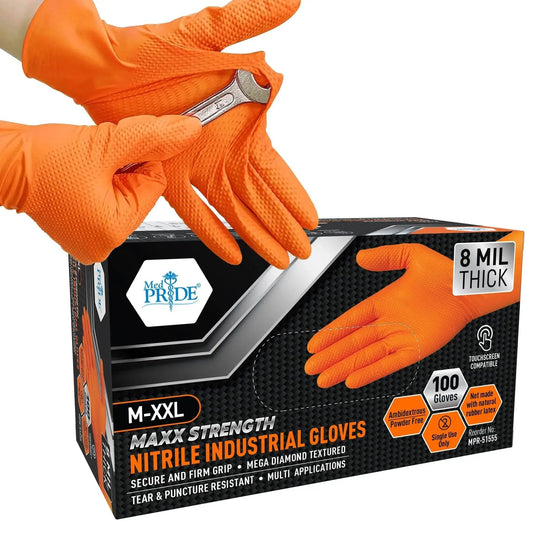 Person wearing Industrial Nitrile Gloves 8 Mil Heavy Duty Diamond Texture Orange Size Large holding a wrench and product box in view.