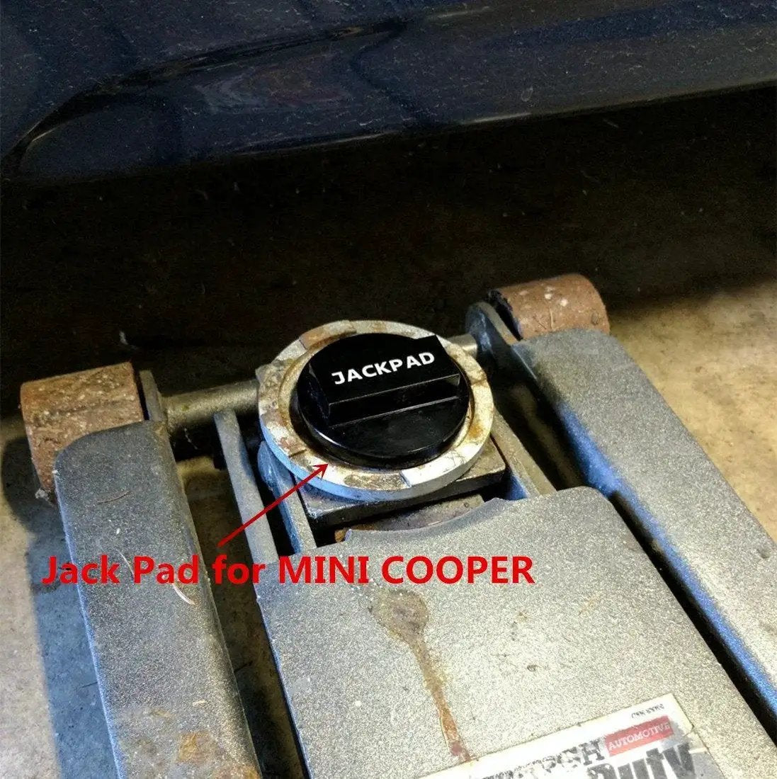 Anodized Black CNC Aluminum Jack Pad Adapter For Safe Vehicle Lifts installed on floor jack for Mini Cooper