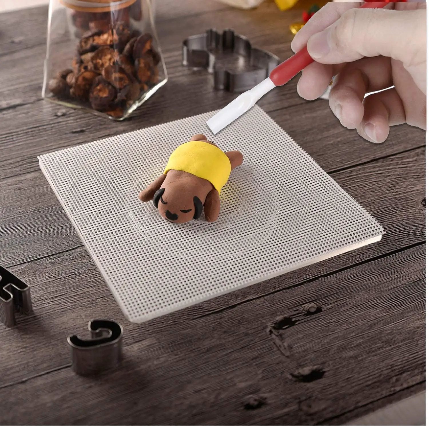 7 Inch Square Cookie Decorating Turntable With Clear Acrylic Bearing Base And Non Slip Mat showcasing fondant tool use
