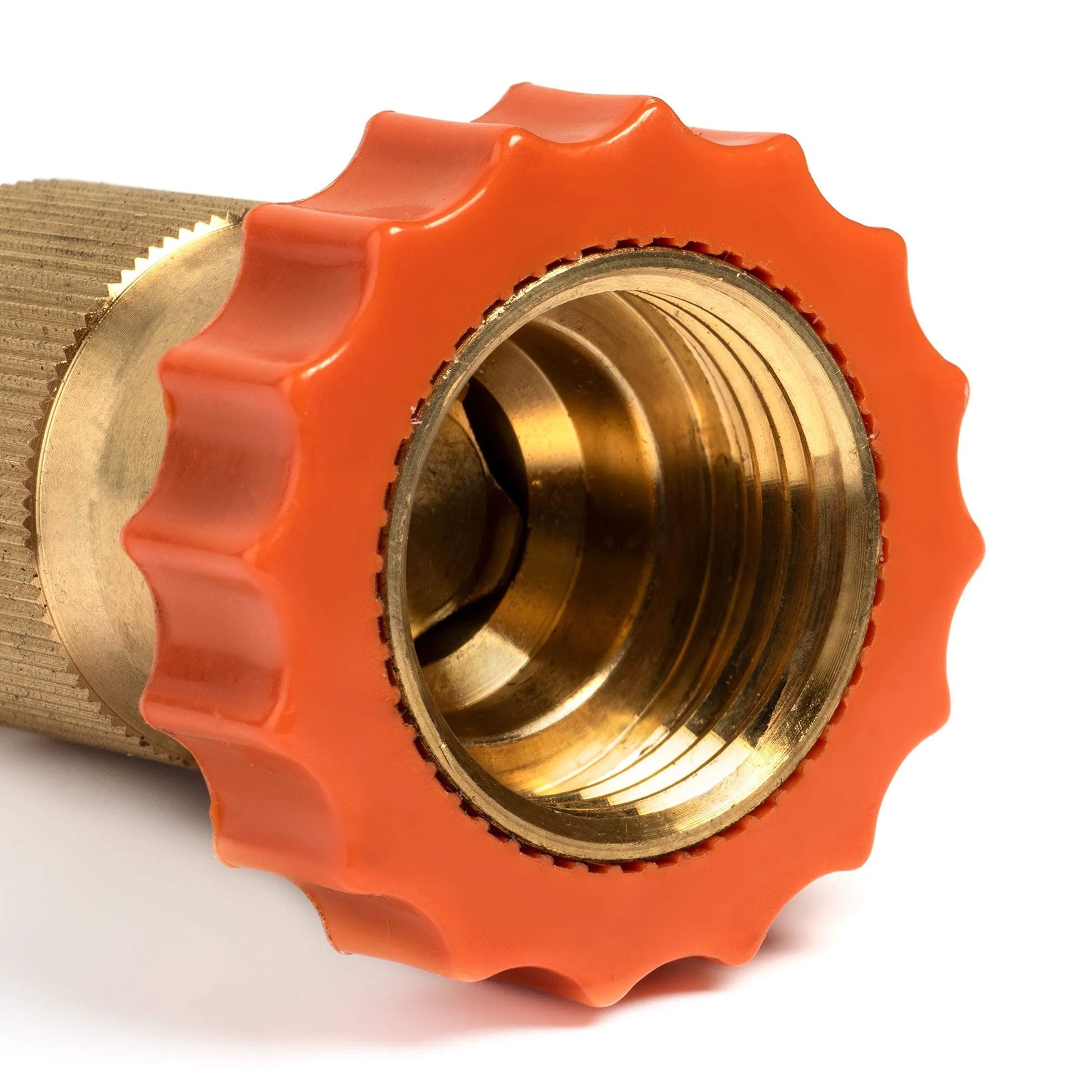 Close-up of brass hose adapter with orange grip from RV Water Filter And Pressure Regulator Kit For Inside And Outside Use Inline Hose Filtration System With ISO Certified KDF And GAC Media For Clean Safe Drinking Water On The Road Camp Must Have.