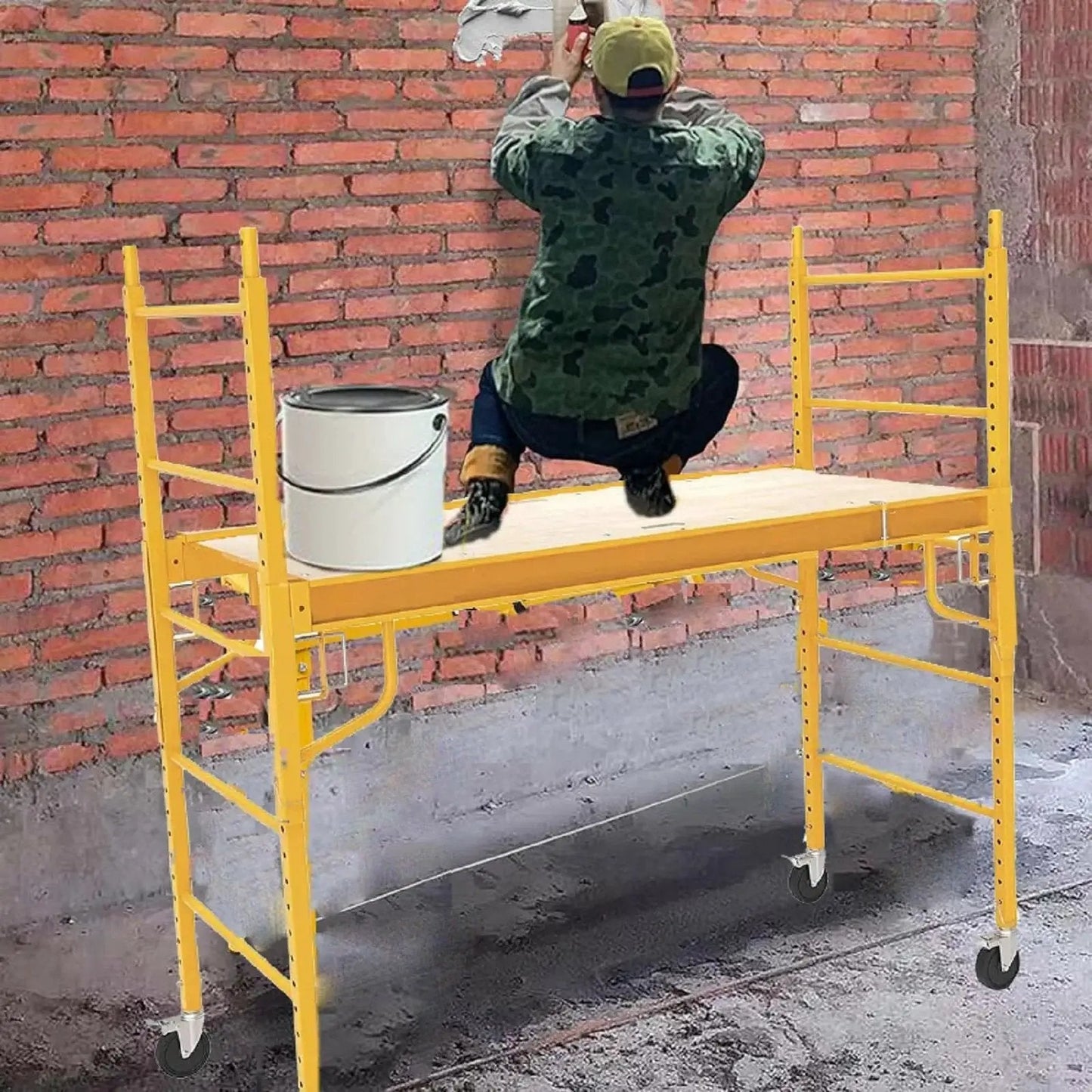 Worker on scaffold with 5 Inch Scaffolding Caster Set Of 4 With Heavy Duty Baker Wheels Dual Locking Brakes And Rubber Tires