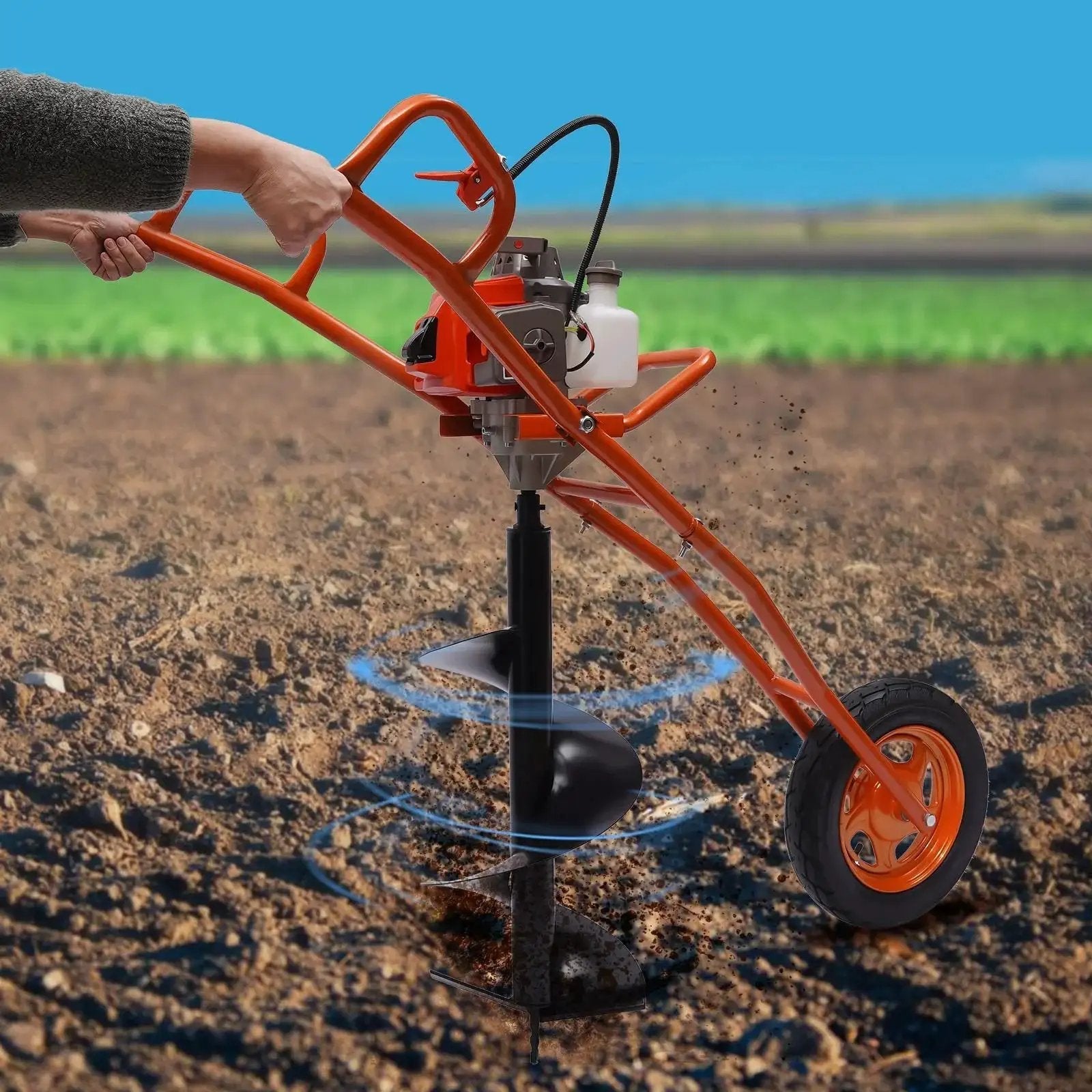 Powerful 63cc 2 Stroke Hole Digger Earth Auger Drill for Quick Potholing and Planting in use, featuring hand push cart and wheel
