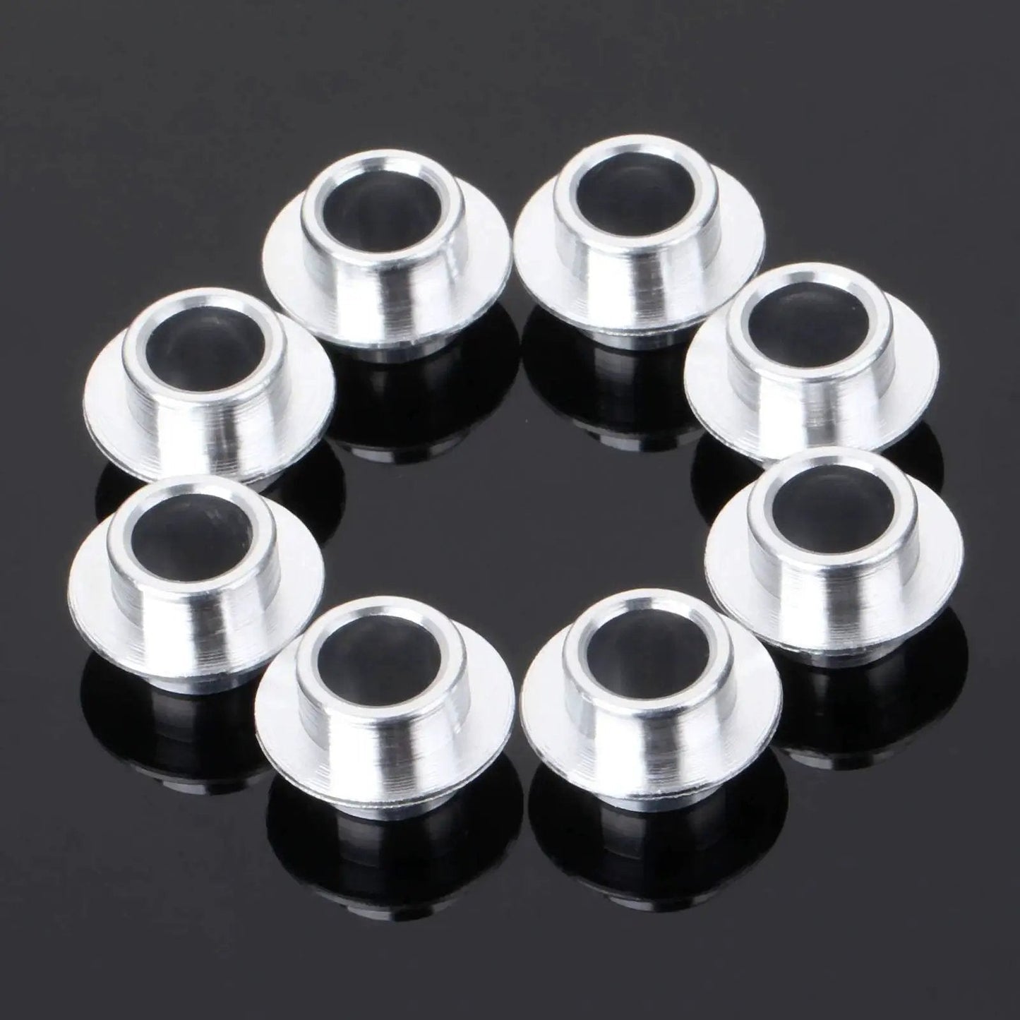 8-Pack Inline Skate Bearing Spacers For 8mm Axles Aluminum Wheel Center Spacers arranged in a circle on black background