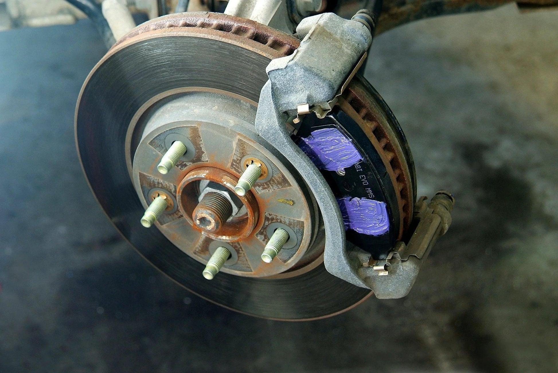 Disc brake system with Ceramic Extreme Brake Parts Lubricant for Disc and Drum Systems, 8 Oz from Permatex applied on pads