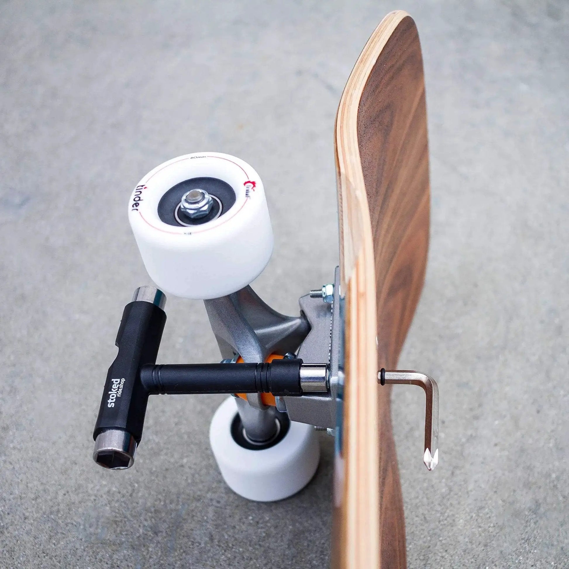 Reds Bearings 8 Pack with tool on skateboard setup showing 608 size bearings for smooth fast rolling ideal for daily use