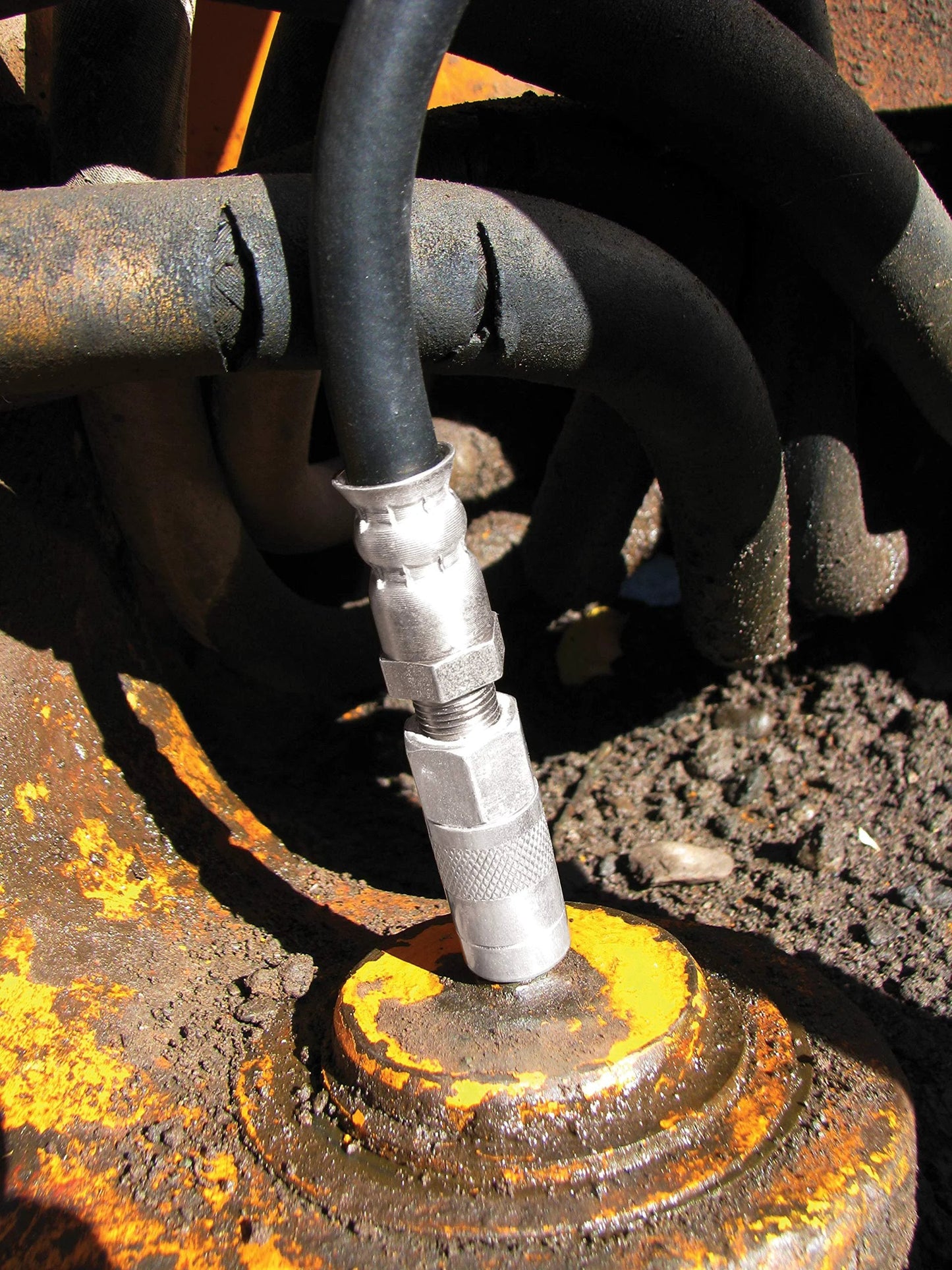 Close-up of Grease Joint Rejuvenator Kit Pro Model Innovative Products Of America for flushing hardened grease from fittings.