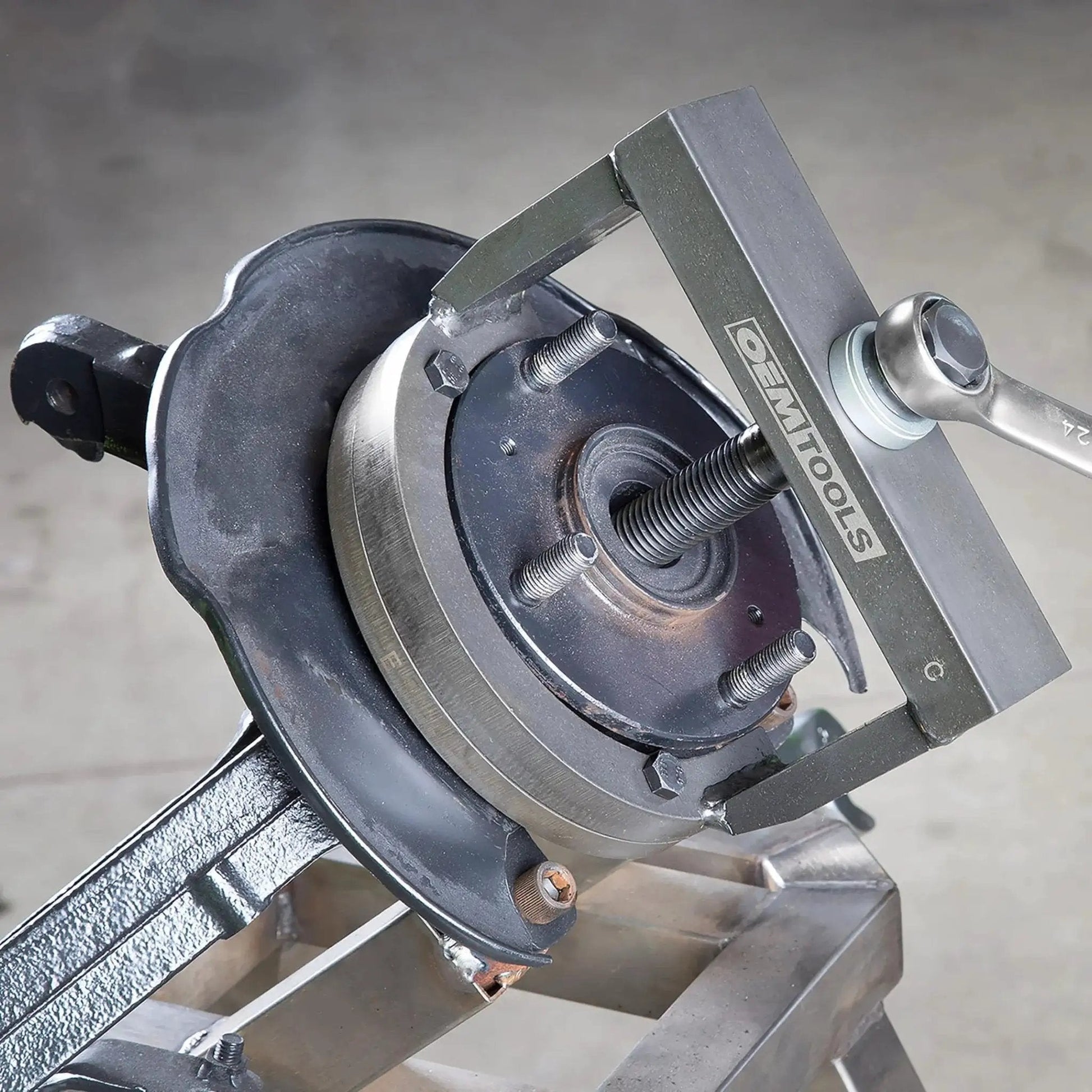 Master Wheel Hub And Bearing Remover And Installer Kit for front and rear bearings, shown in use with no shop press needed.