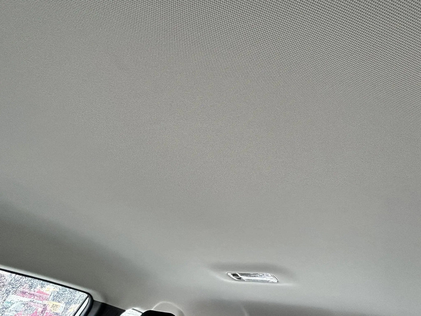 Mesh Headliner Fabric With Foam Backing For All Vehicles 60x40 In Light Grey installed inside a car ceiling view
