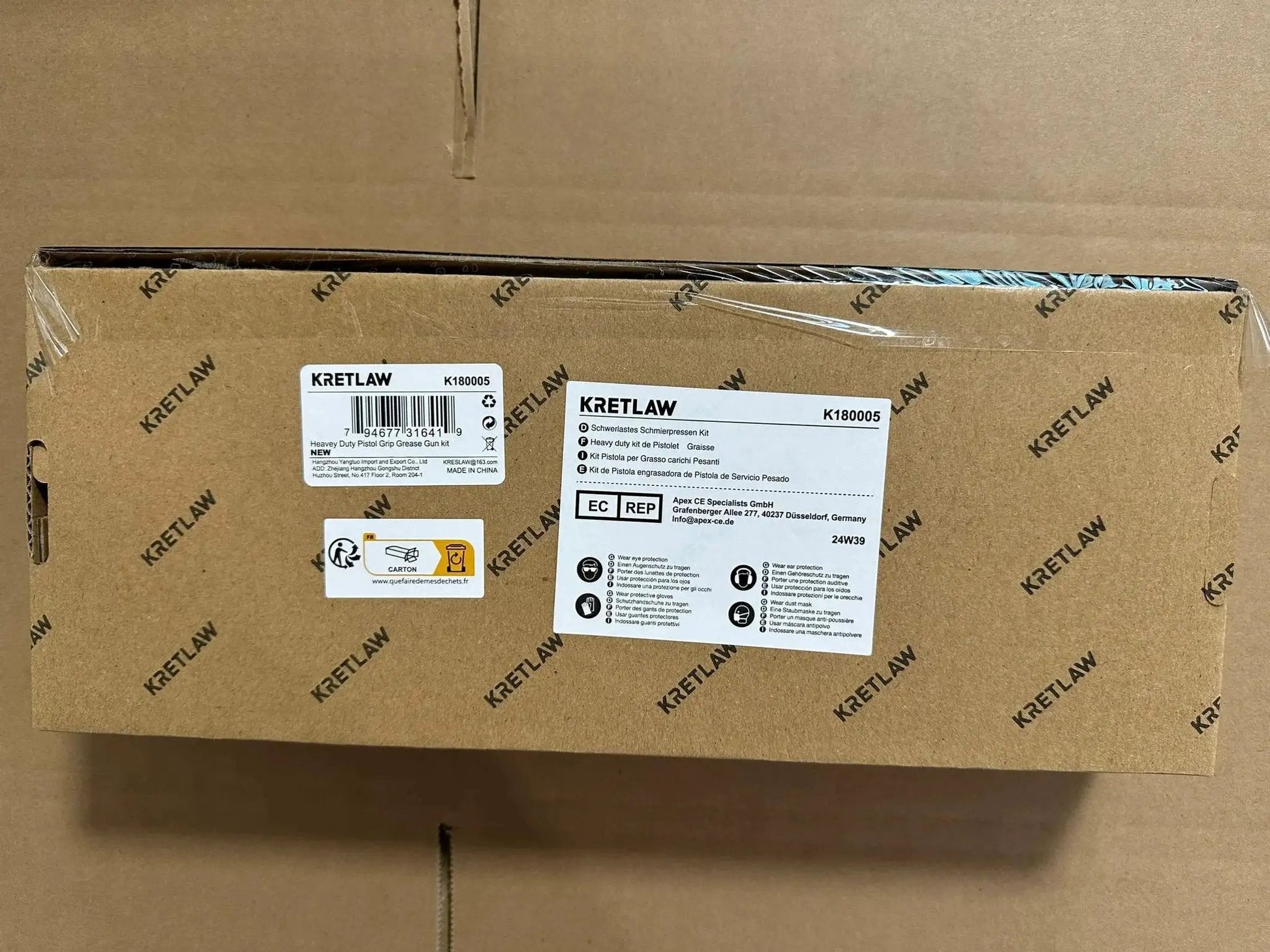 Box packaging of Heavy Duty 7000 PSI Pistol Grip Grease Gun Kit With 14 Oz Cartridge, 18 Inch Spring Hose, and accessories by KRETLAW