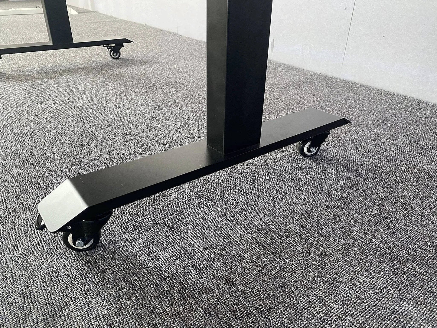 Standing desk base with 2 Inch M8 Threaded PU Swivel Casters Set Of 4 With Brakes for mobility on a carpeted floor